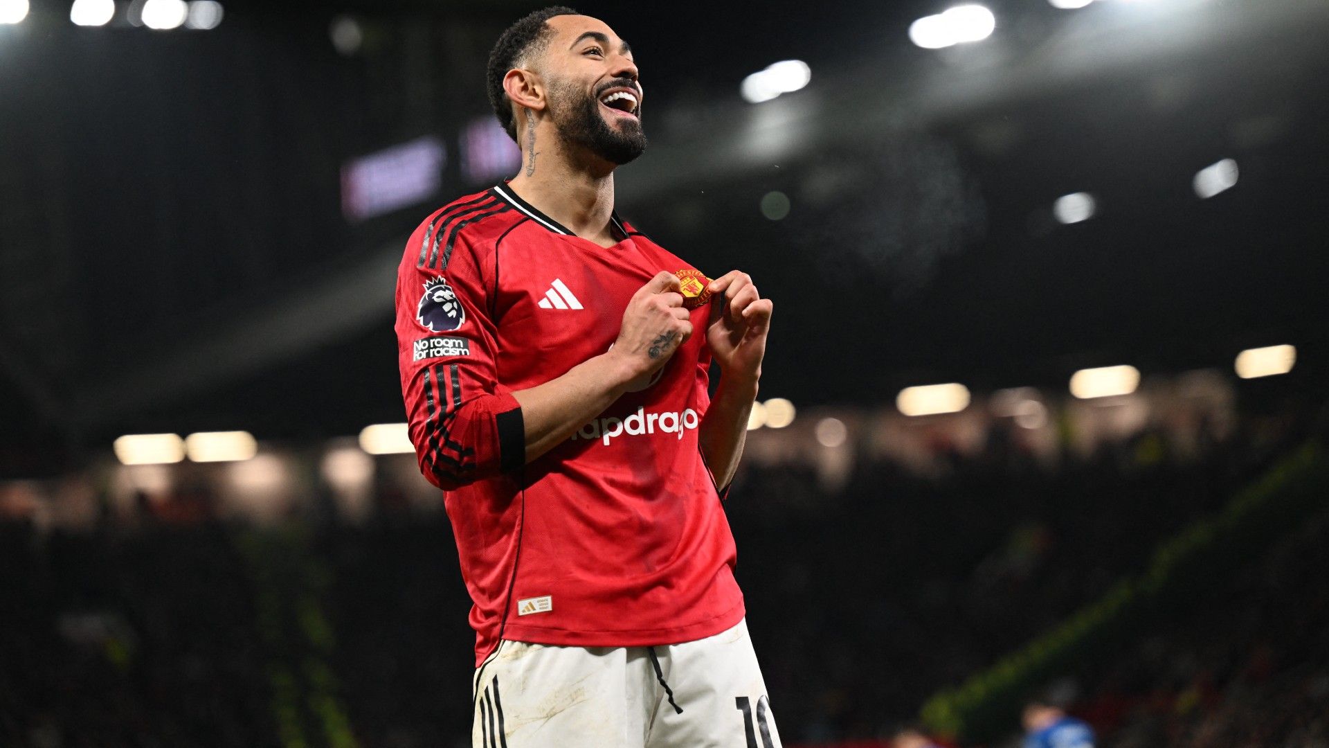 Manchester United's Brazilian striker #10 Matheus Cunha celebrates scoring