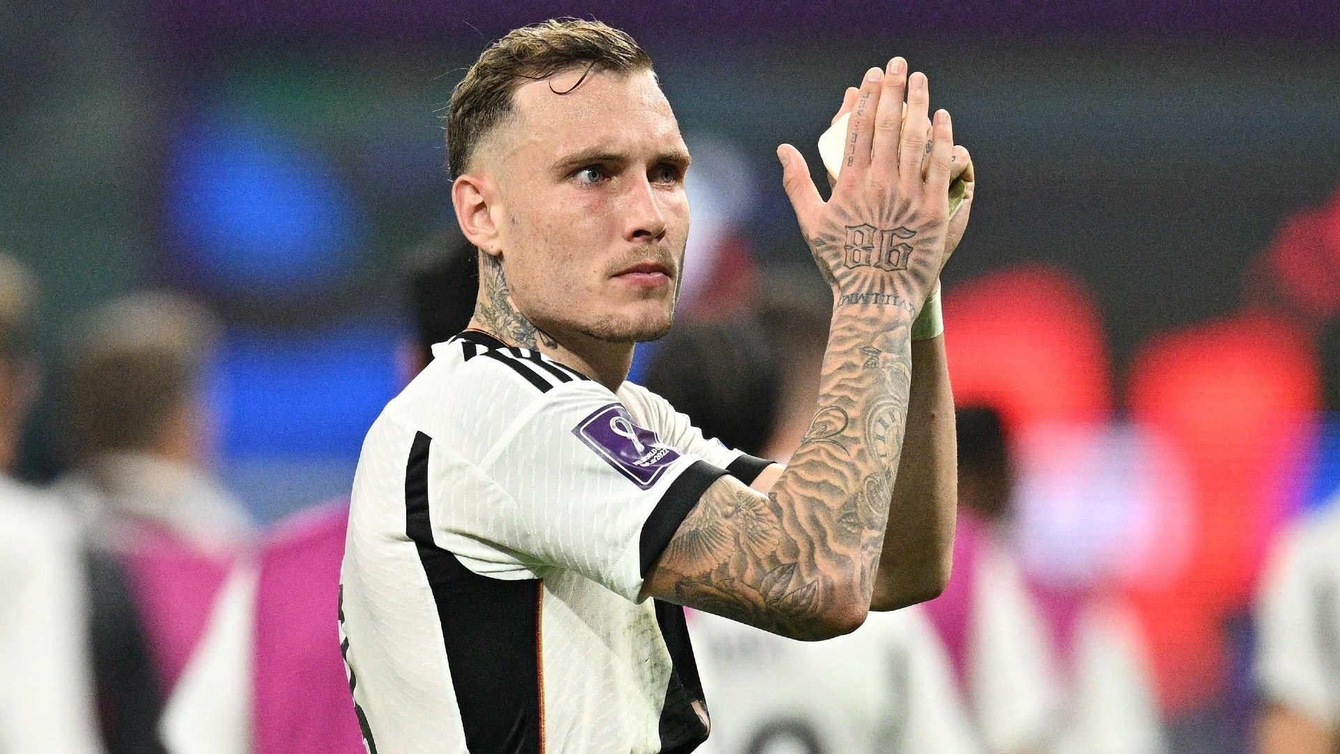 David Raum of Germany applauds fans