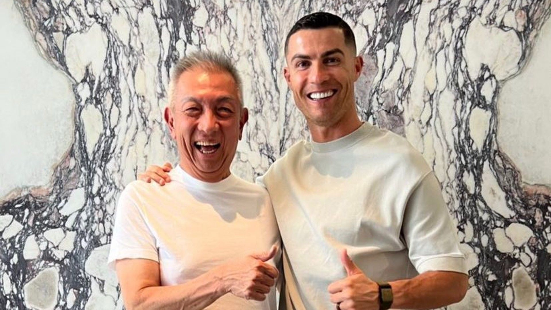 Peter Lim y Cristiano Ronaldo