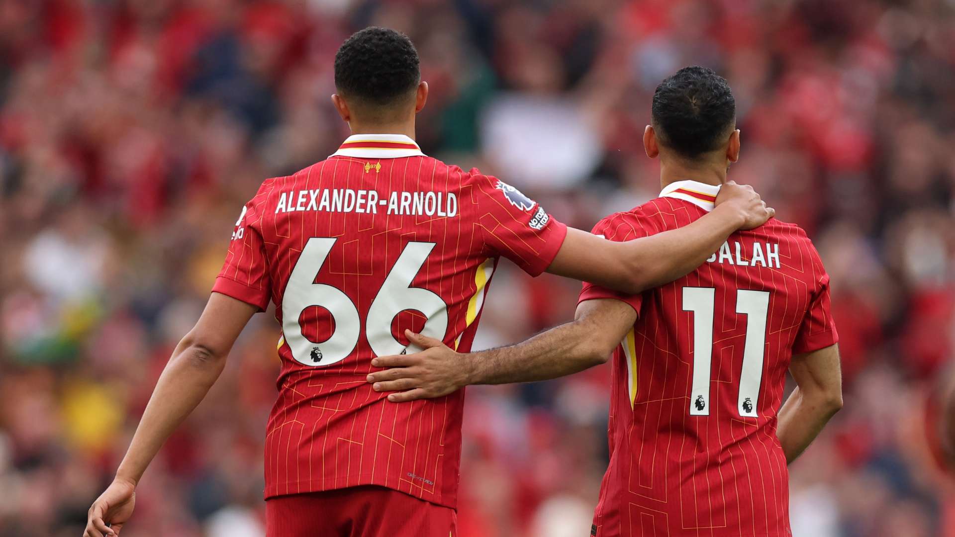 Mohamed Salah of Liverpool celebrates scoring his team's first goal with teammate Trent Alexander-Arnold