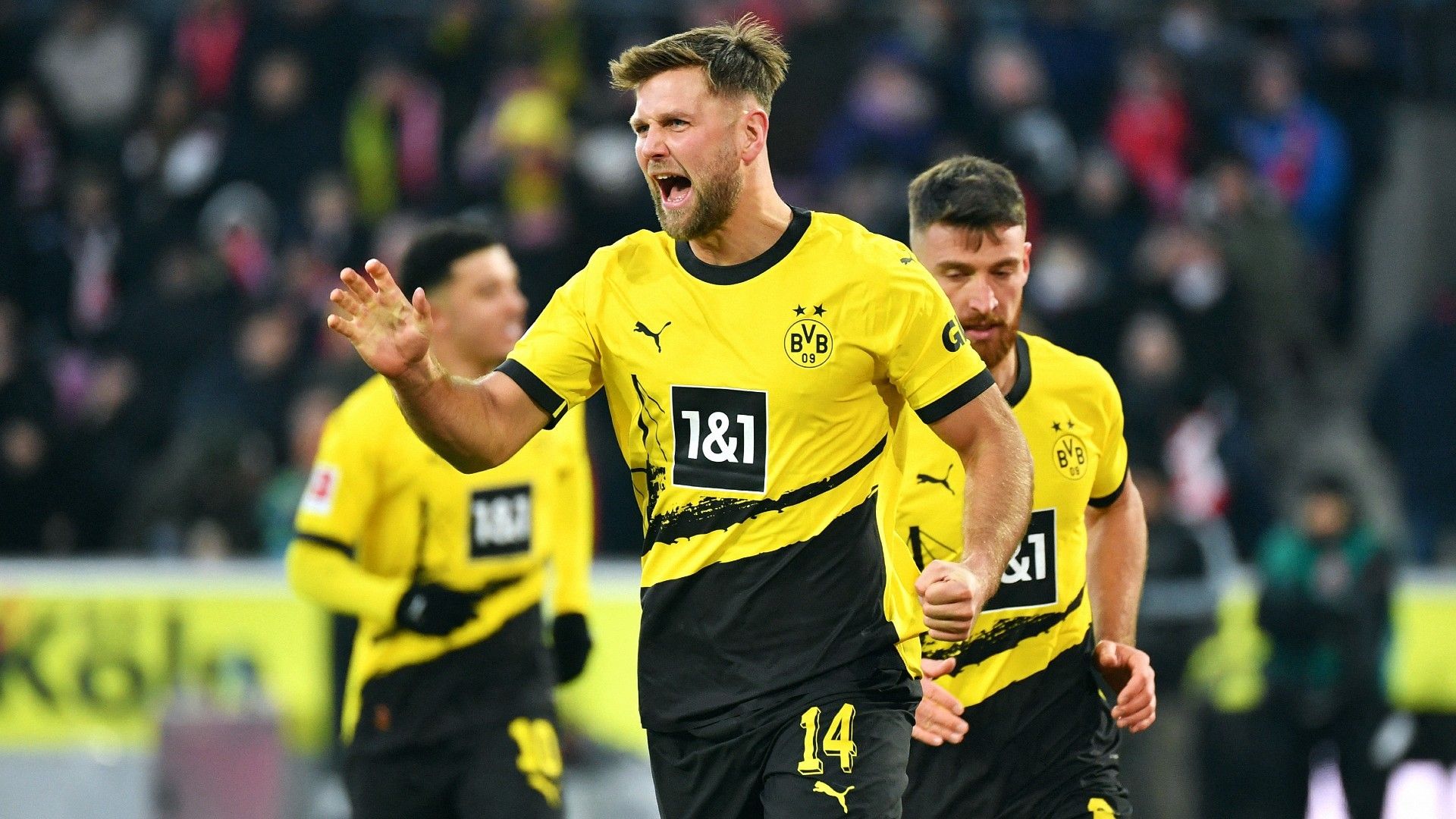 Dortmund's German forward #14 Niclas Fuellkrug celebrates