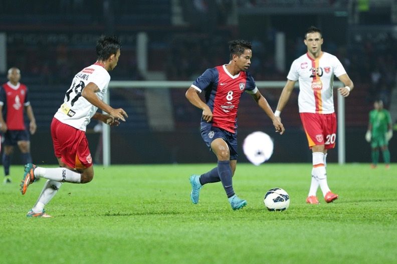 JDT skipper Safiq Rahim in the thick of things against Sime Darby FC.