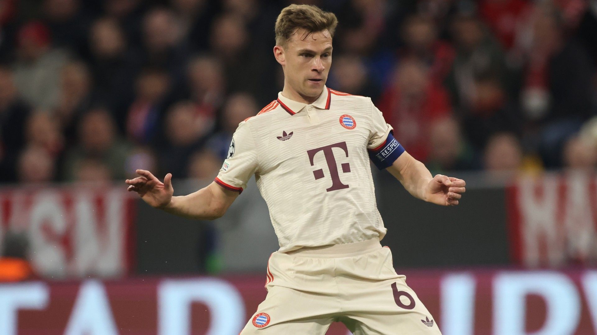 Joshua Kimmich of Bayern Muenchen controls the ball