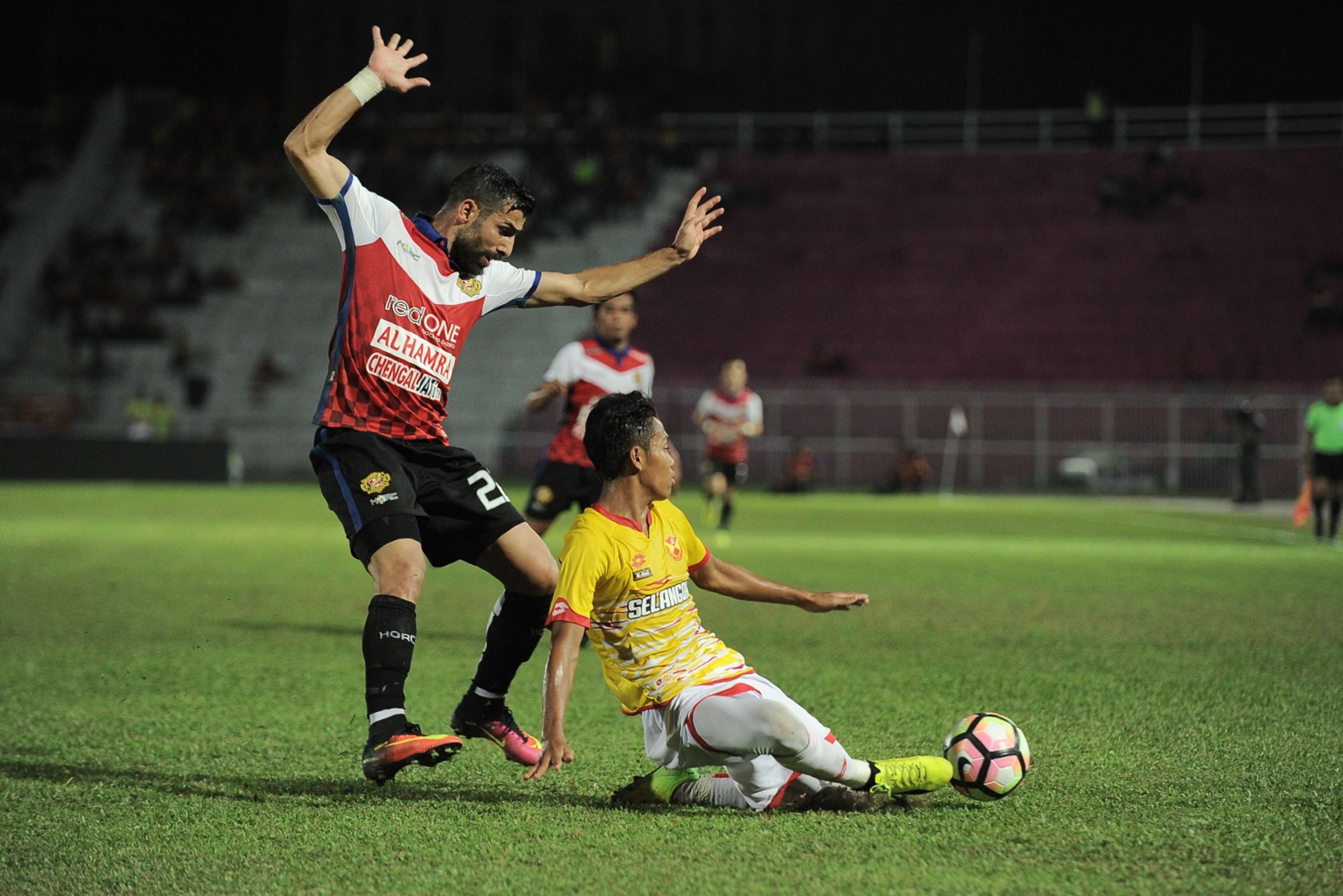 Kelantan's Mohammed Ghaddar (left) playing against Selangor 25/2/2017