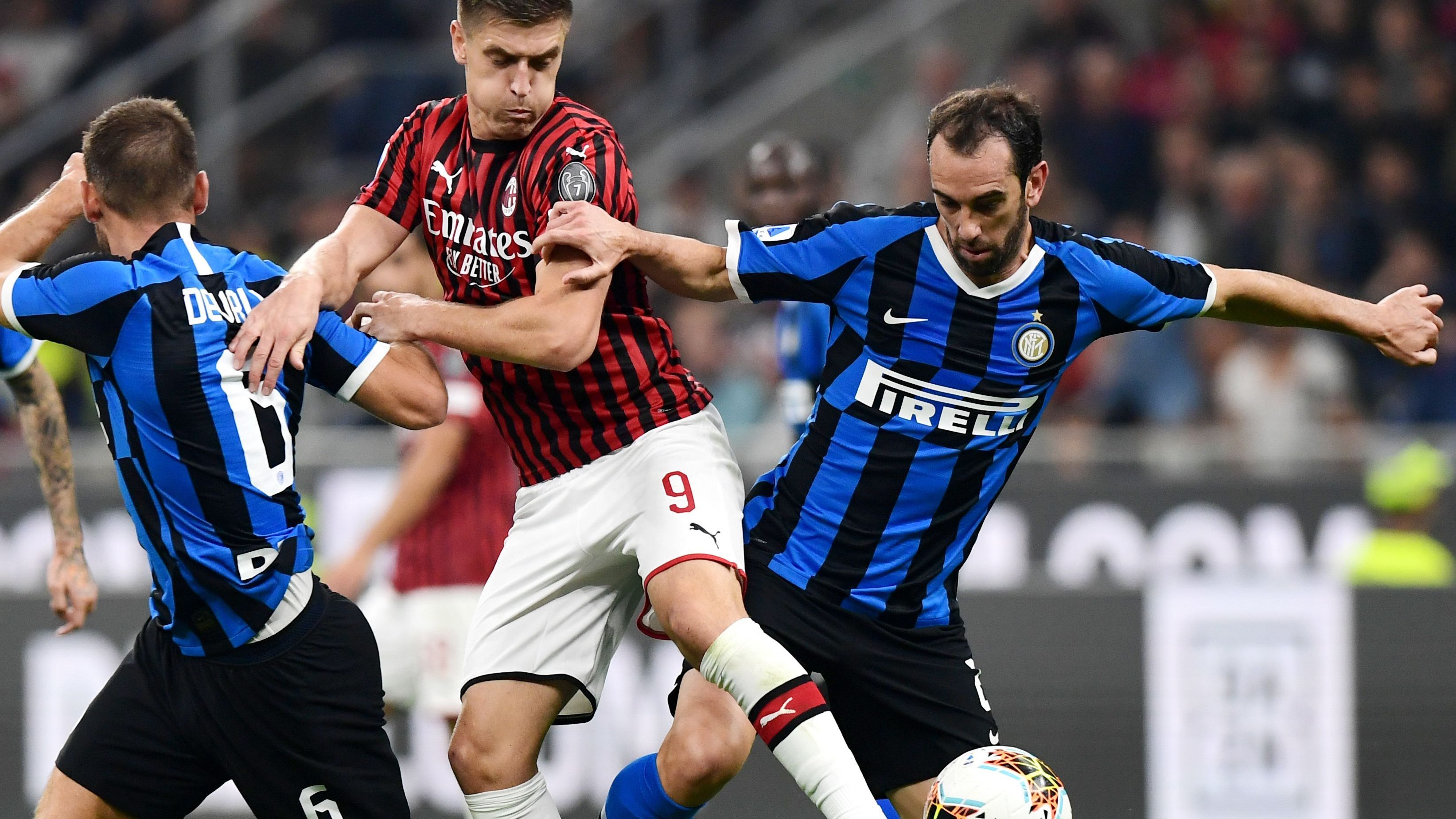 Krzyzstof Piatek Diego Godin Milan-Inter