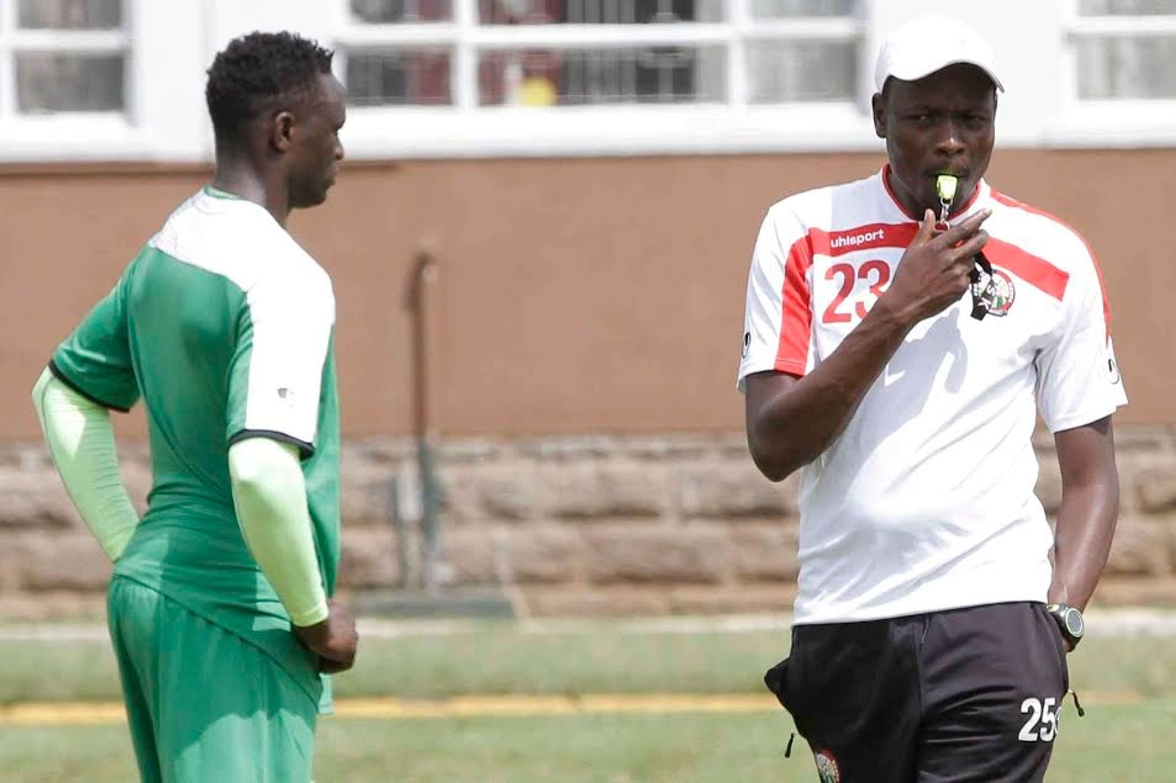 Harambee Stars coach Stanley Okumbi with captain Victor Wanyama