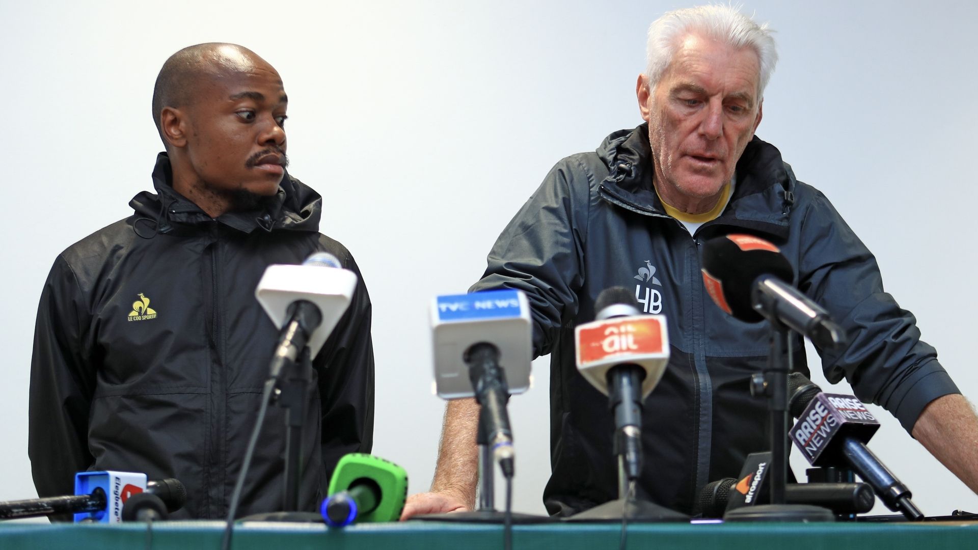 Percy Tau and Hugo Broos