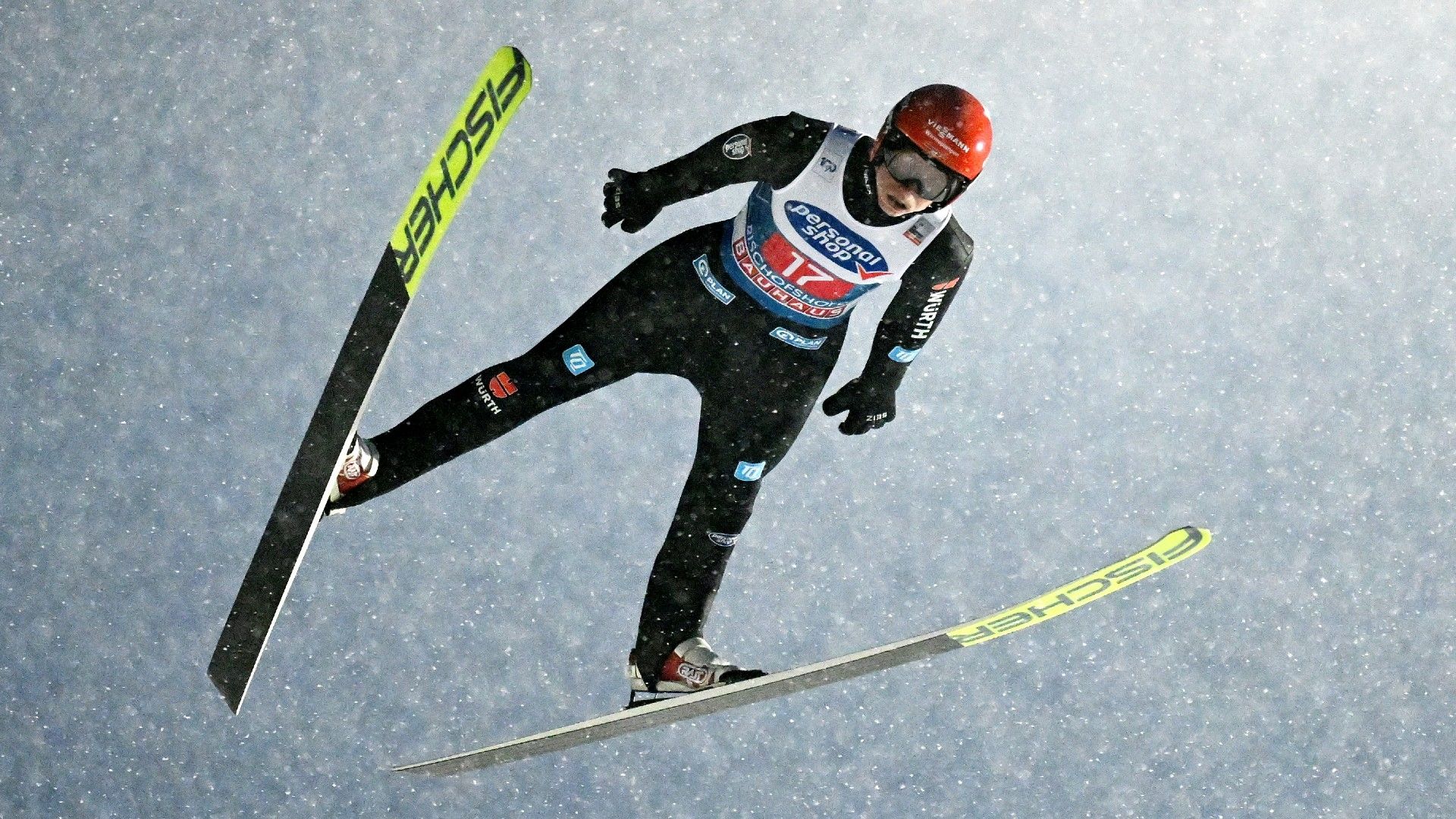 Karl Geiger of Germany competes