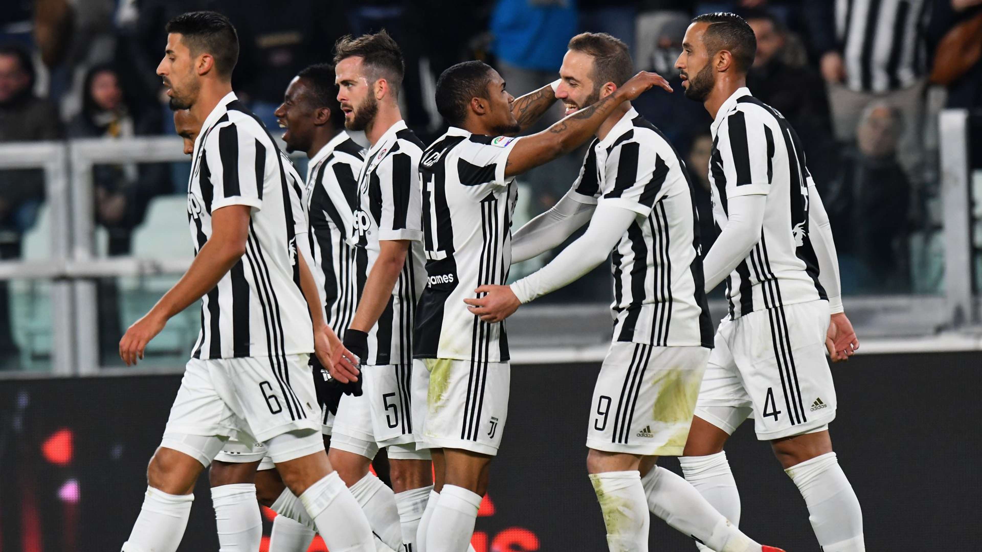 Juventus celebrates Douglas Costa goal against Genoa