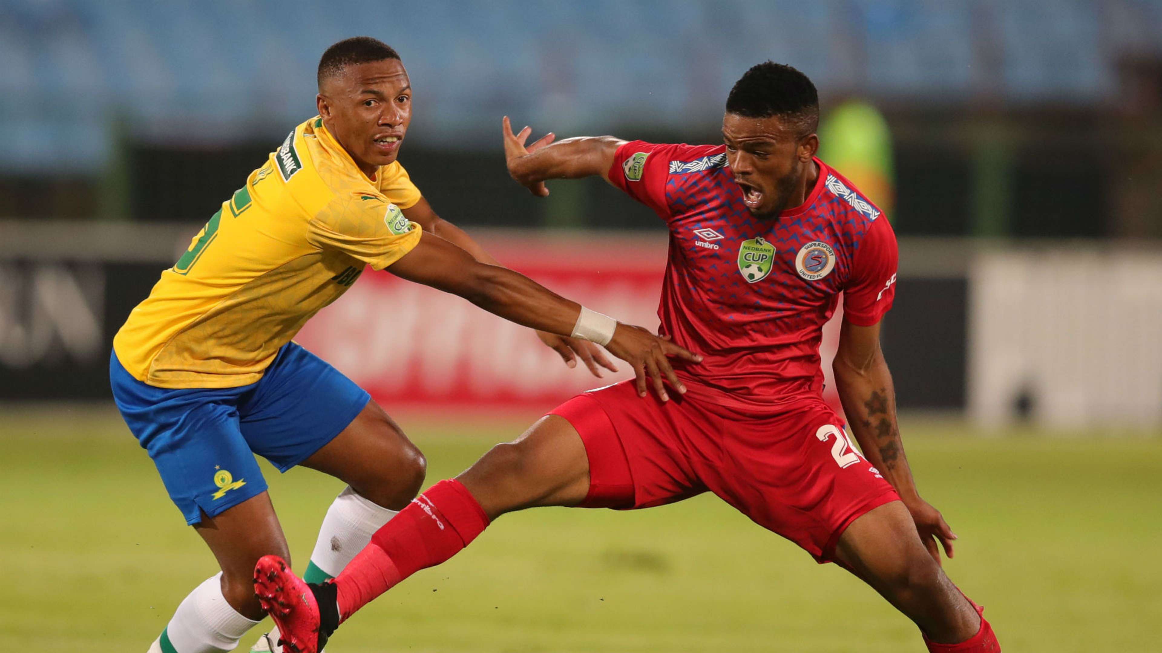 Sipho Mbule of SuperSport United challenged by Andile Jali of Mamelodi Sundowns, February 2020
