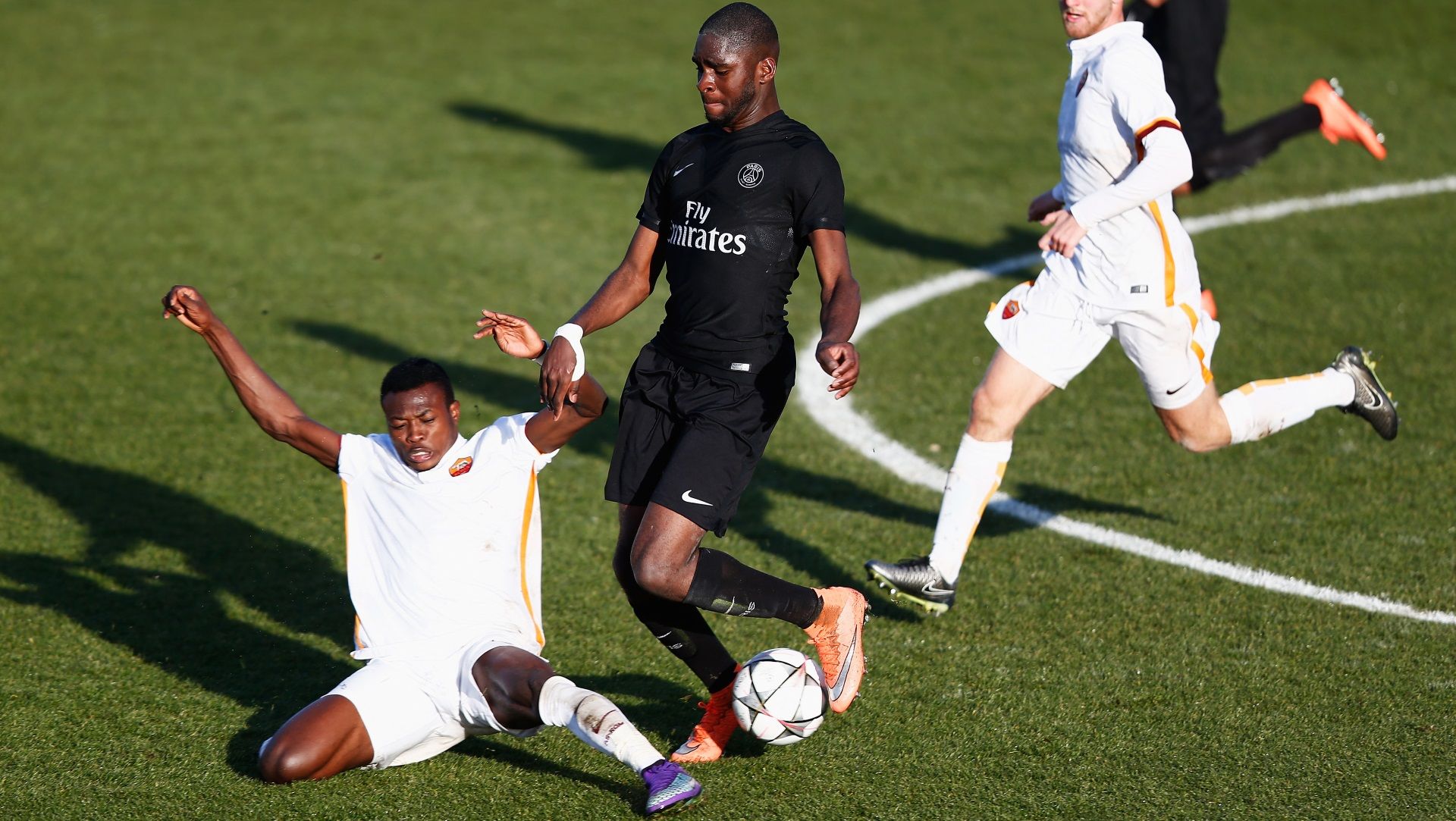 Nura Abdullahi of Roma and Odsonne Edouard of PSG