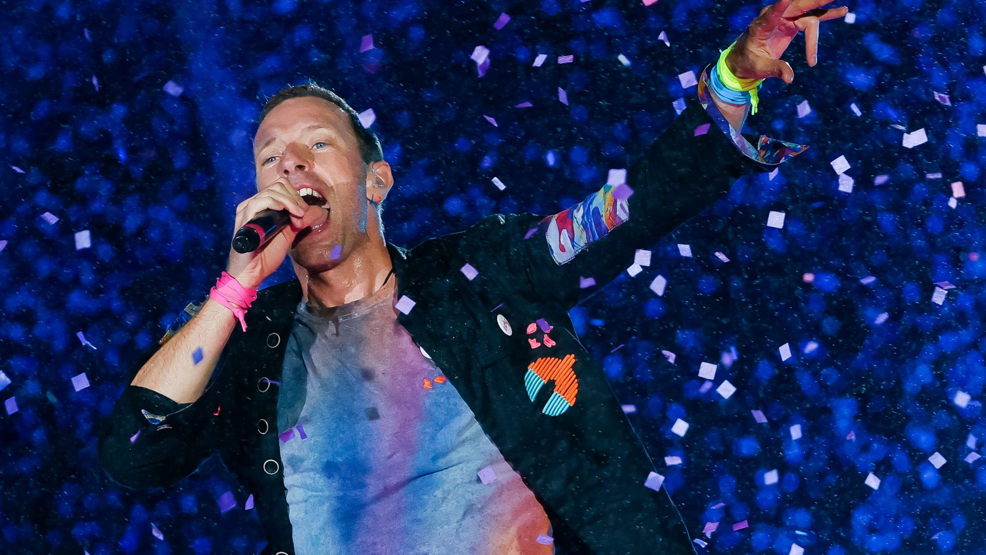 Chris Martin Coldplay performing