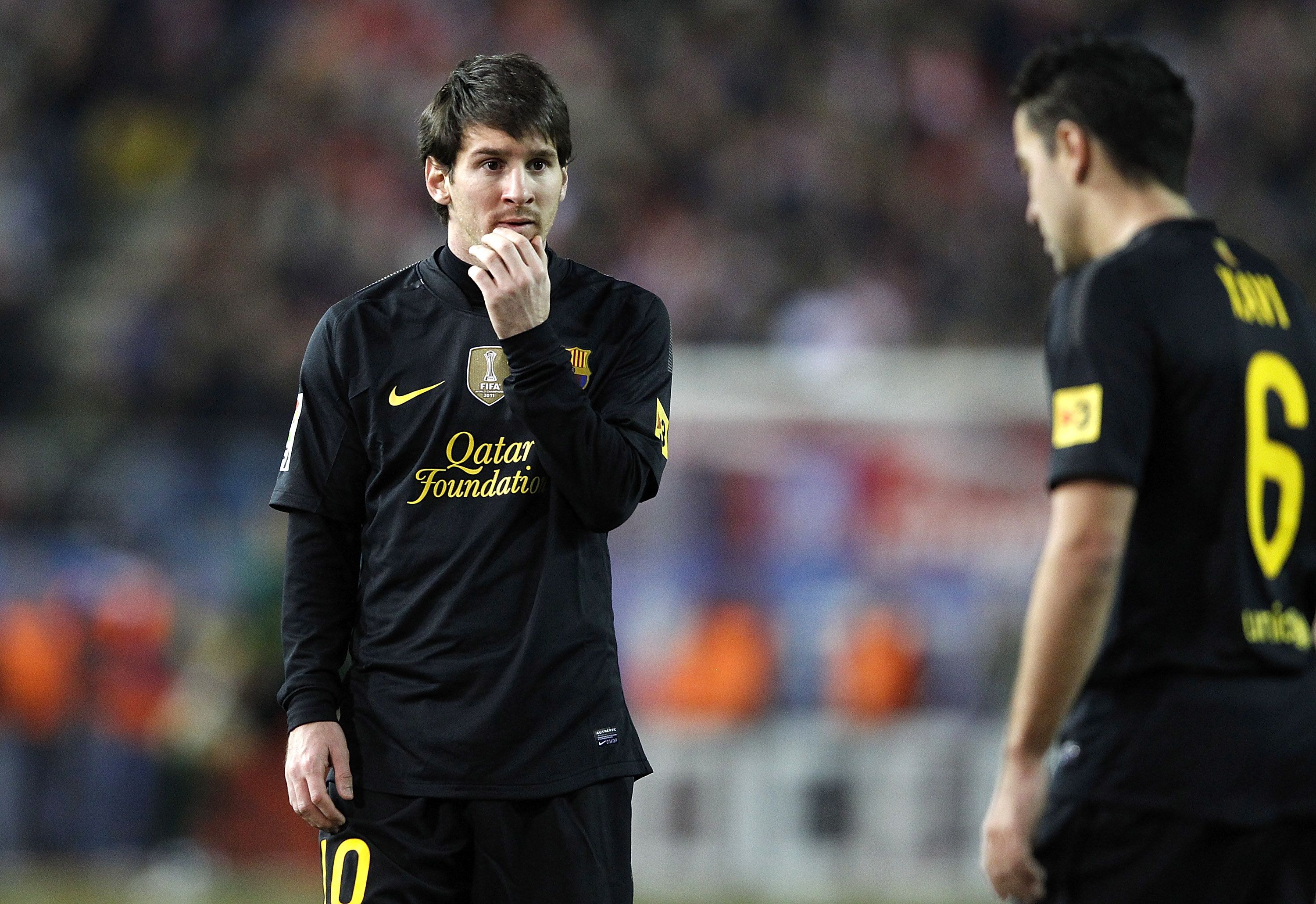 atletico madrid vs barcelona , messi , xavi