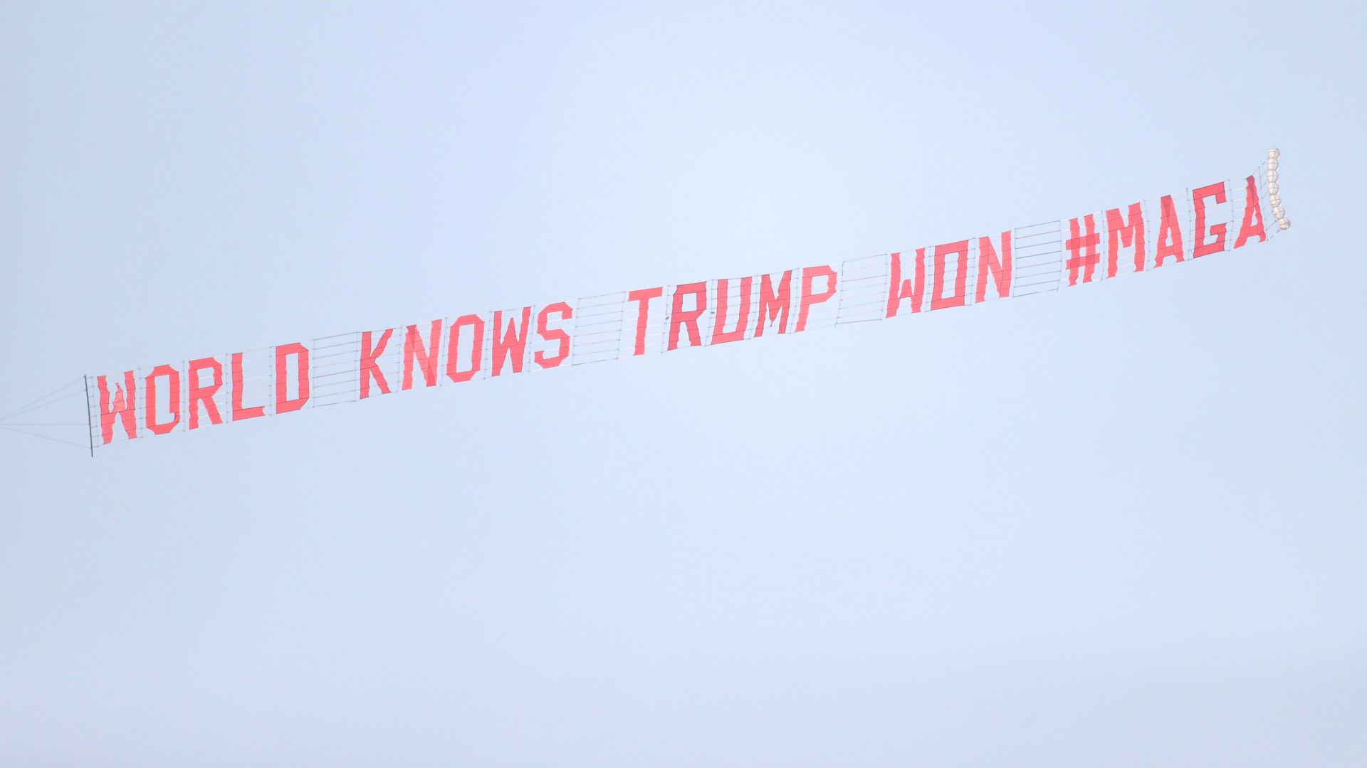 Trump banner Everton Manchester United