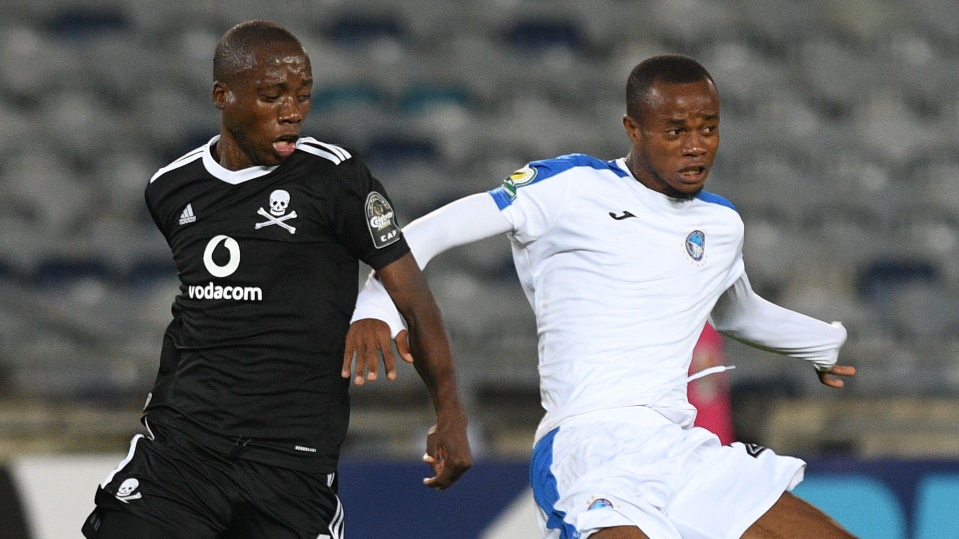 Ben Motshwari of Orlando Pirates challenged by Mbaoma Chukwuma of Enyimba, March 2021