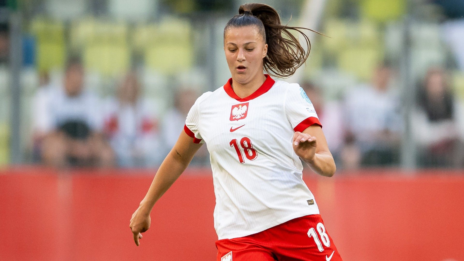 Emilia Szymczak of Poland controls the ball 