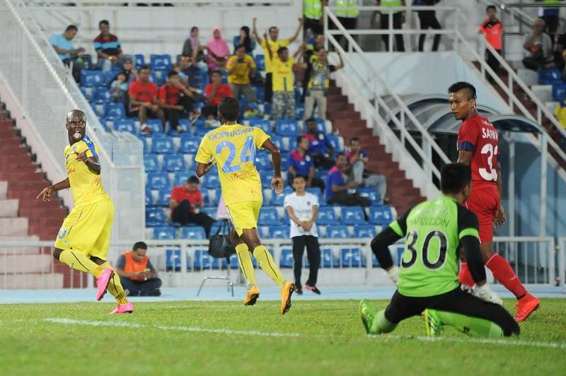 Pahang hitman Dickson Nwakaeme wheels away in celebration after scoring against ATM.