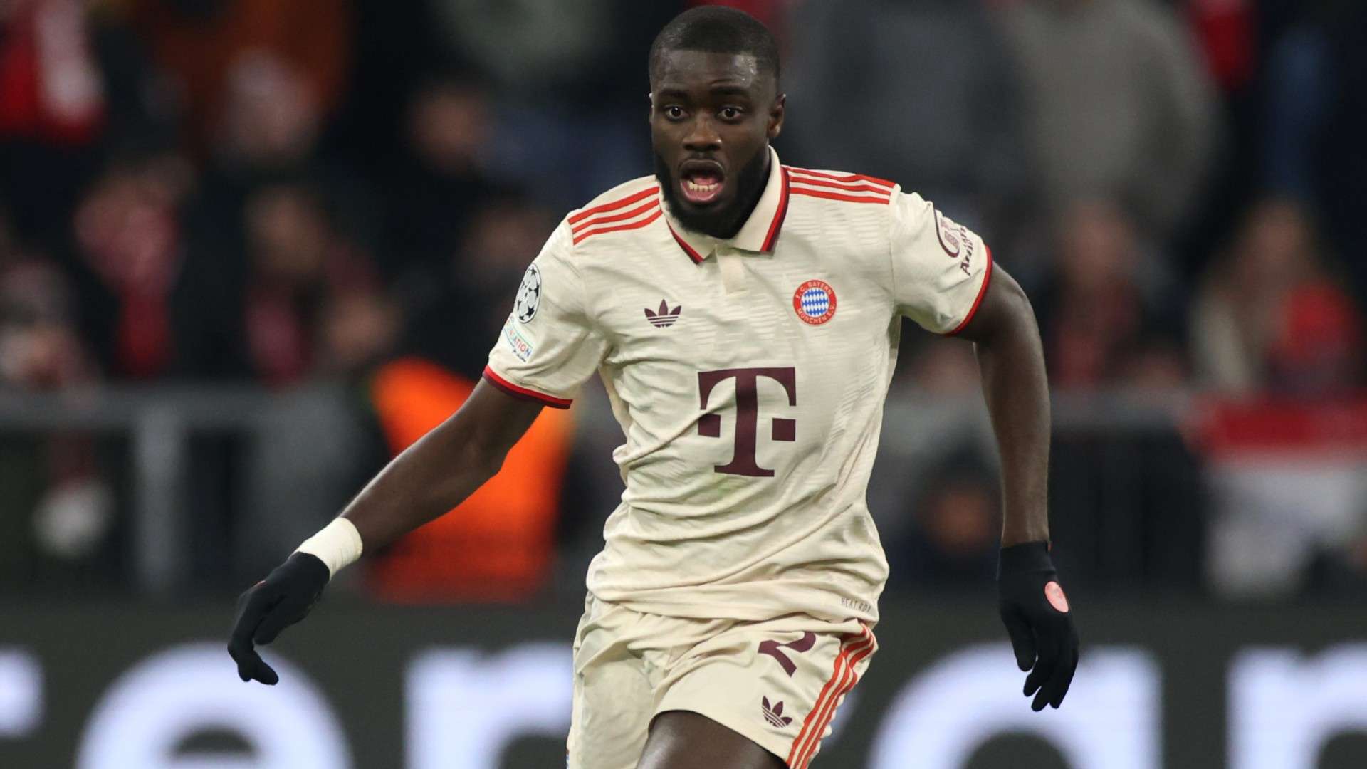 Dayot Upamecano of Bayern Muenchen controls the ball