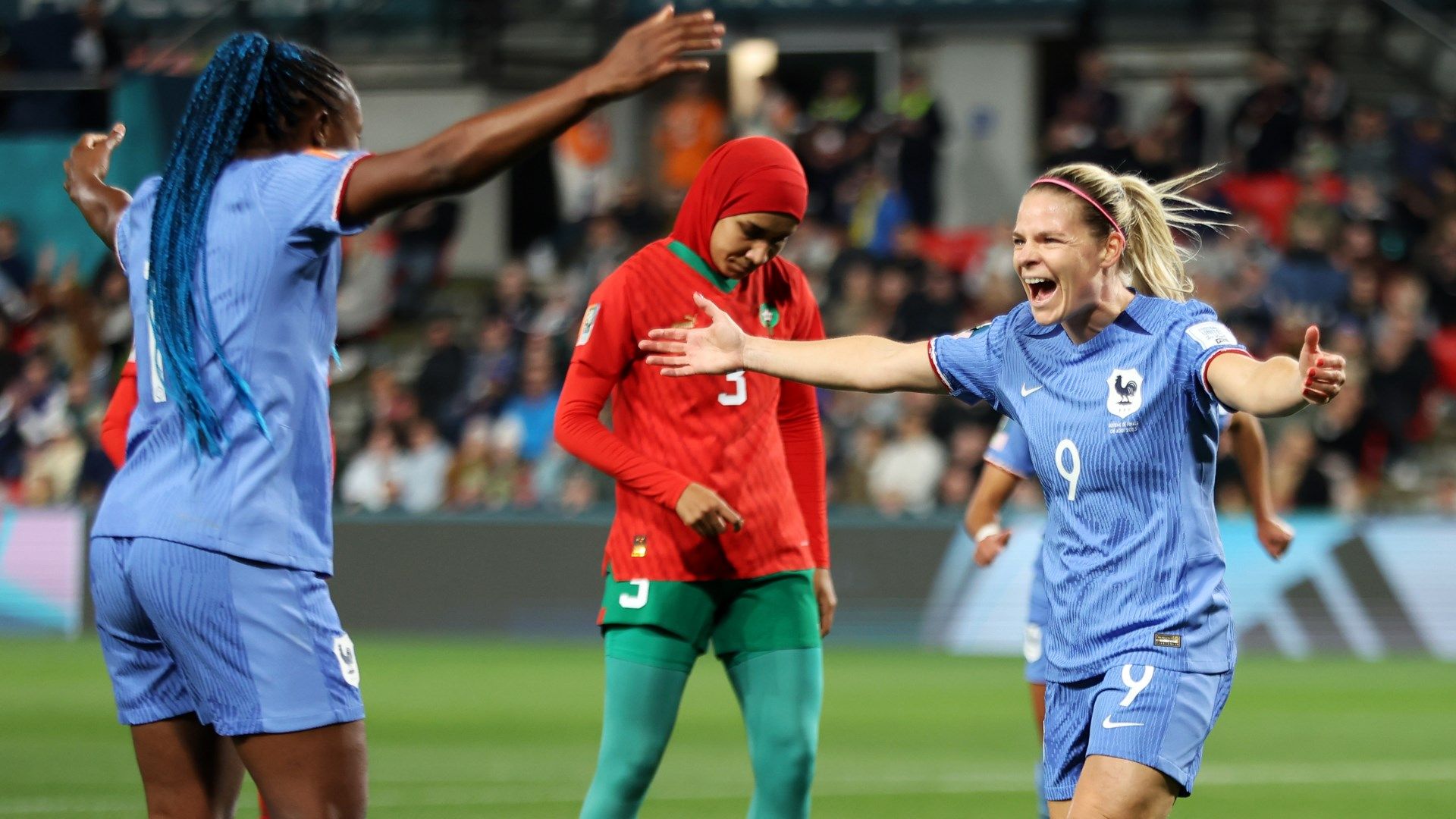 Eugenie Le Sommer celebrates with Kadidiatou Diani after scoring her first goal for France against Morocco at Women's World Cup