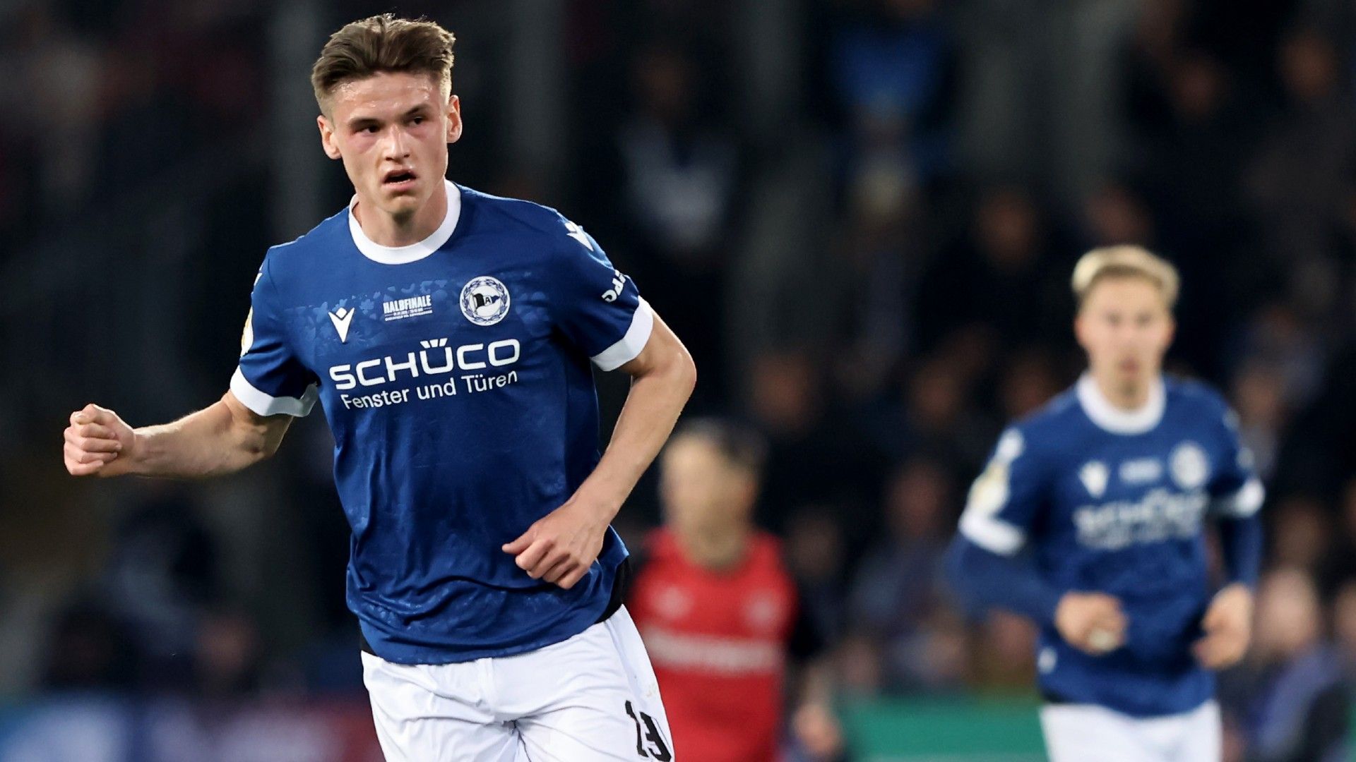 Maximilian Grosser of Bielefeld runs with the ball  