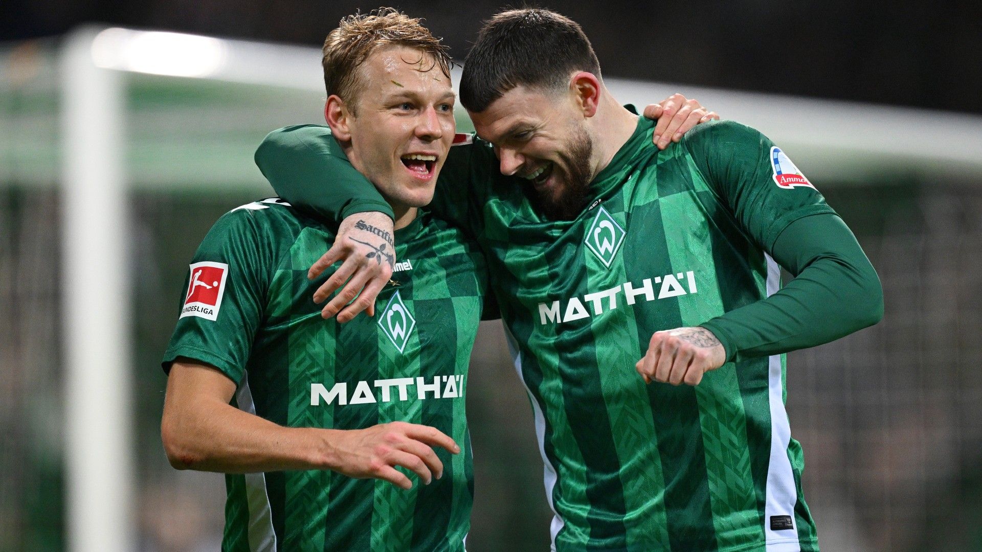Marco Gruell and Oliver Burke of Werder Bremen