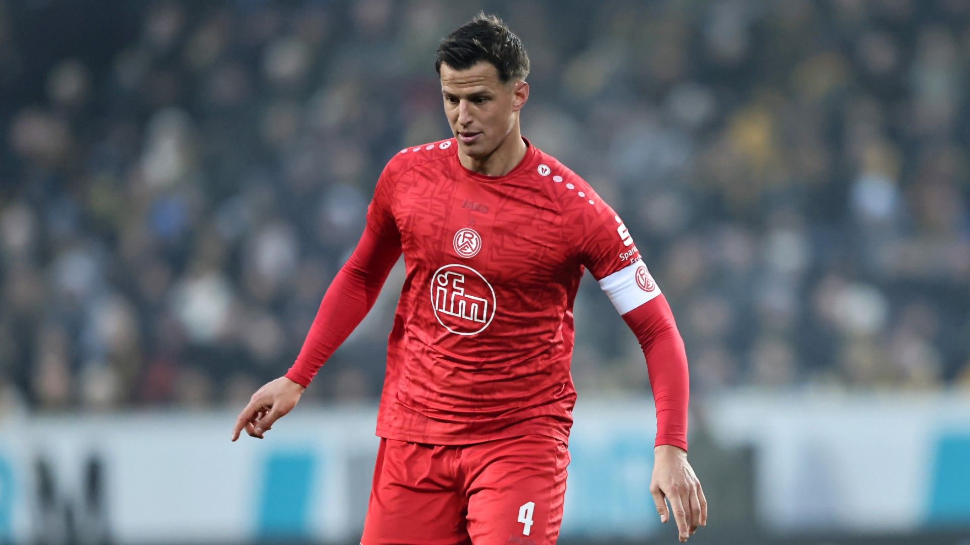 Michael Schultz of Rot-Weiss Essen runs with the ball 