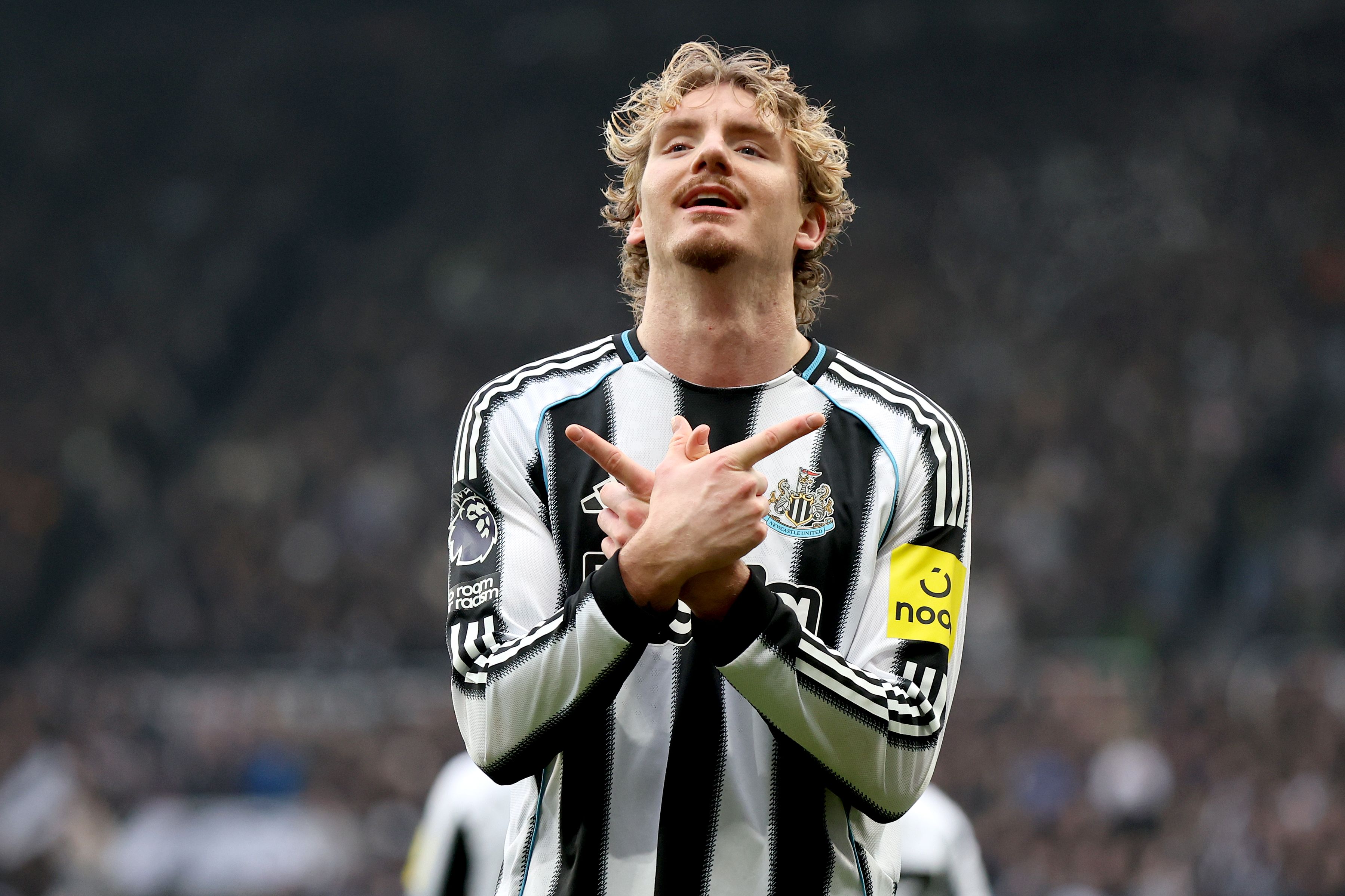 Nick Woltemade of Newcastle United celebrates scoring