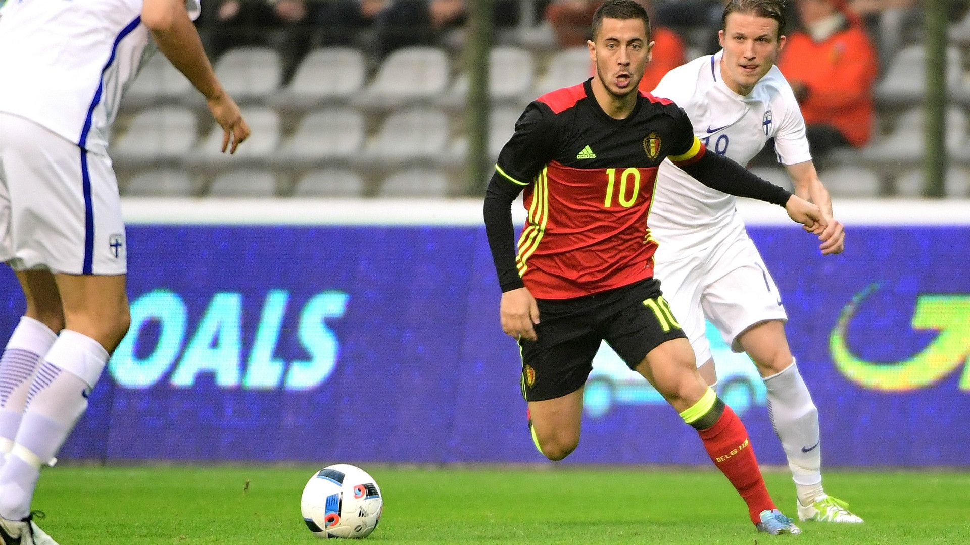 Belgium's midfielder Eden Hazard runs with the ball during a Friendly match against Finland