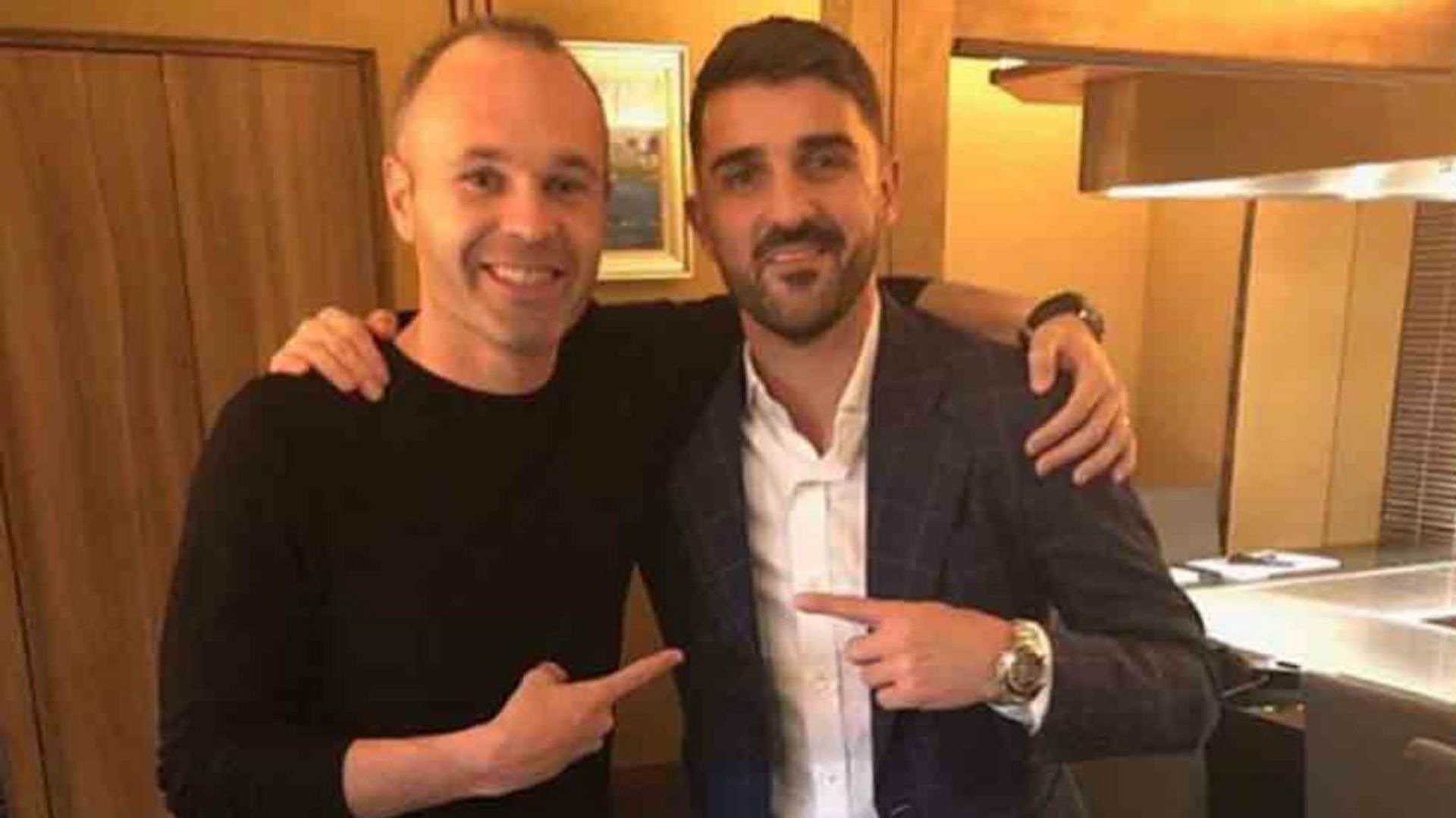 Andrés Iniesta y David Villa