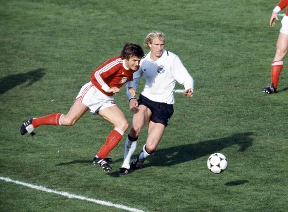 Lubanski (left) in action for Poland