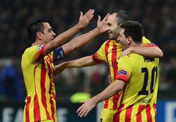 Barcelona's Xavi, Iniesta and Messi