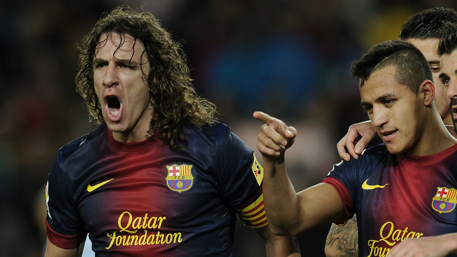 Carles Puyol Alexis Sanchez Barcelona