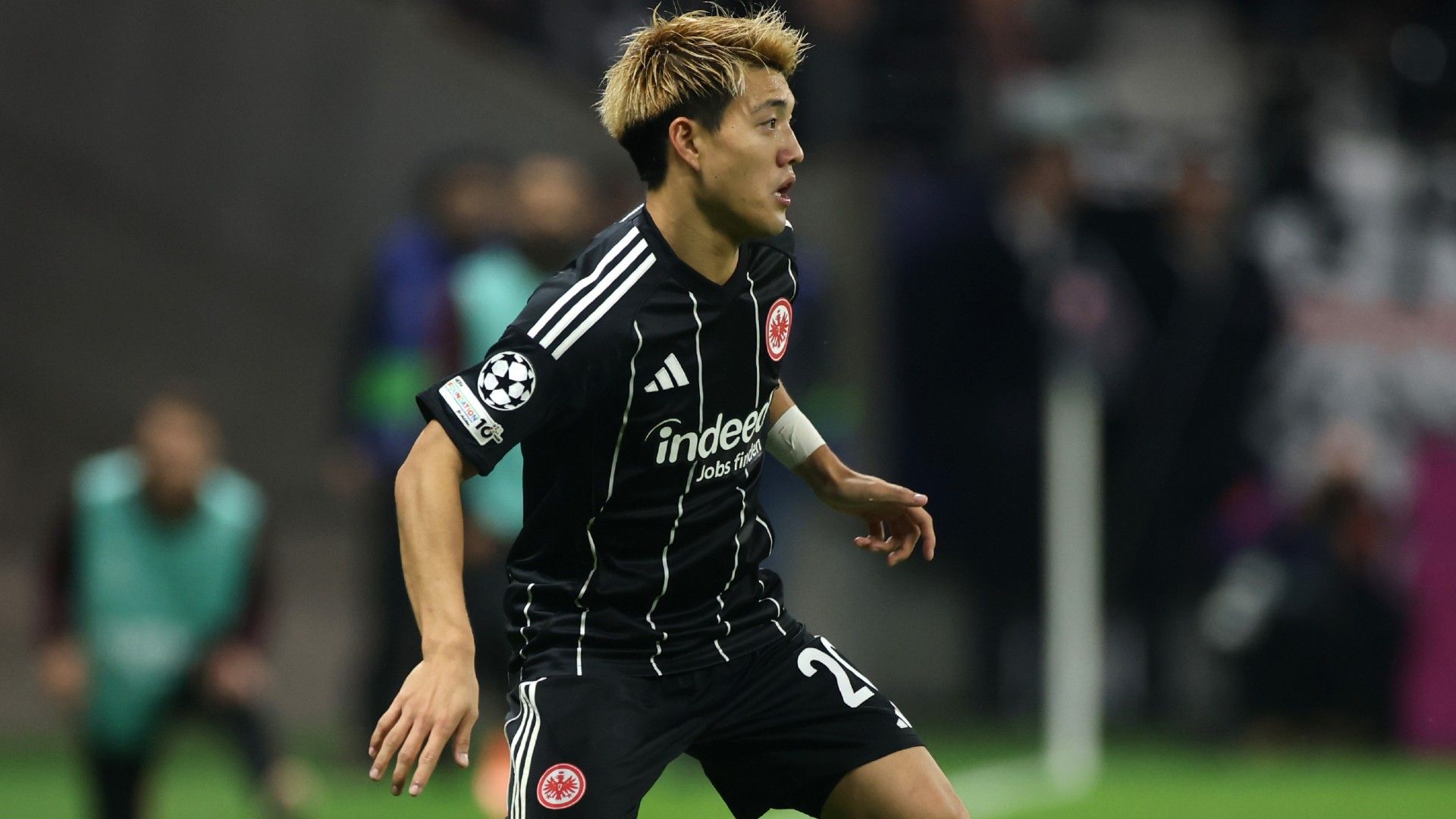 Ritsu Doan of Eintracht Frankfurt controls the ball