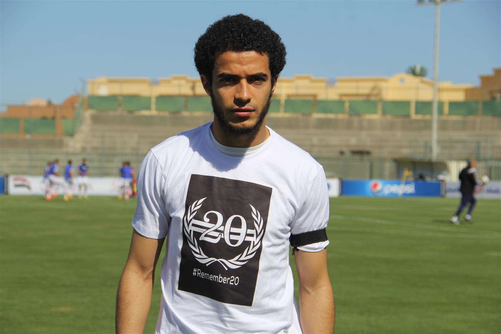 Omar Gaber wearing a shirt Martyrs Zamalek