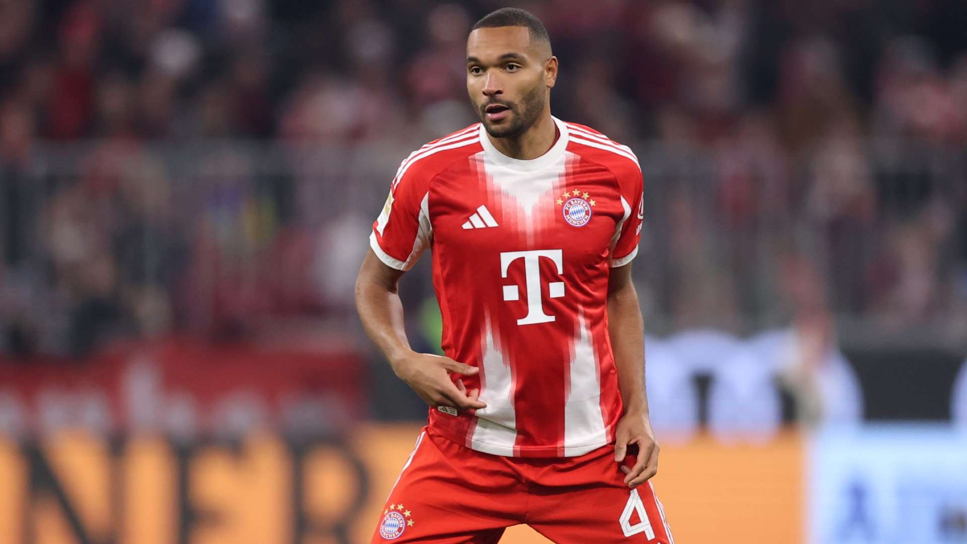 Jonathan Tah of FC Bayern Munich controls the ball