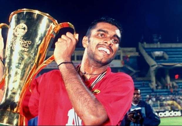 Singapore's R. Sasikumar lifting the 1998 AFF Cup
