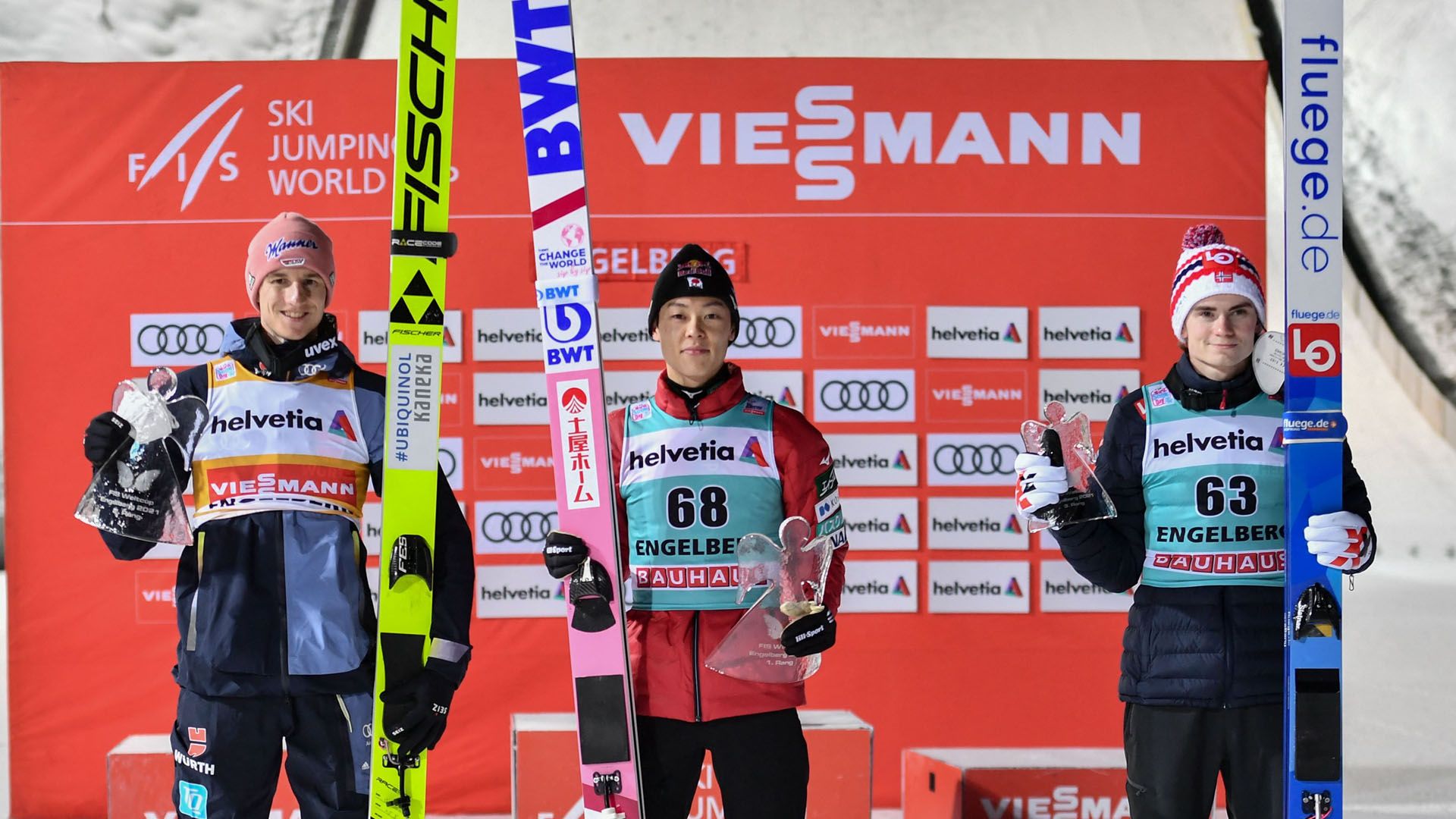Second placed Germany's Karl Geiger, winner Japan's Ryoyu Kobayashi and third placed Norway's Marius Lindvik