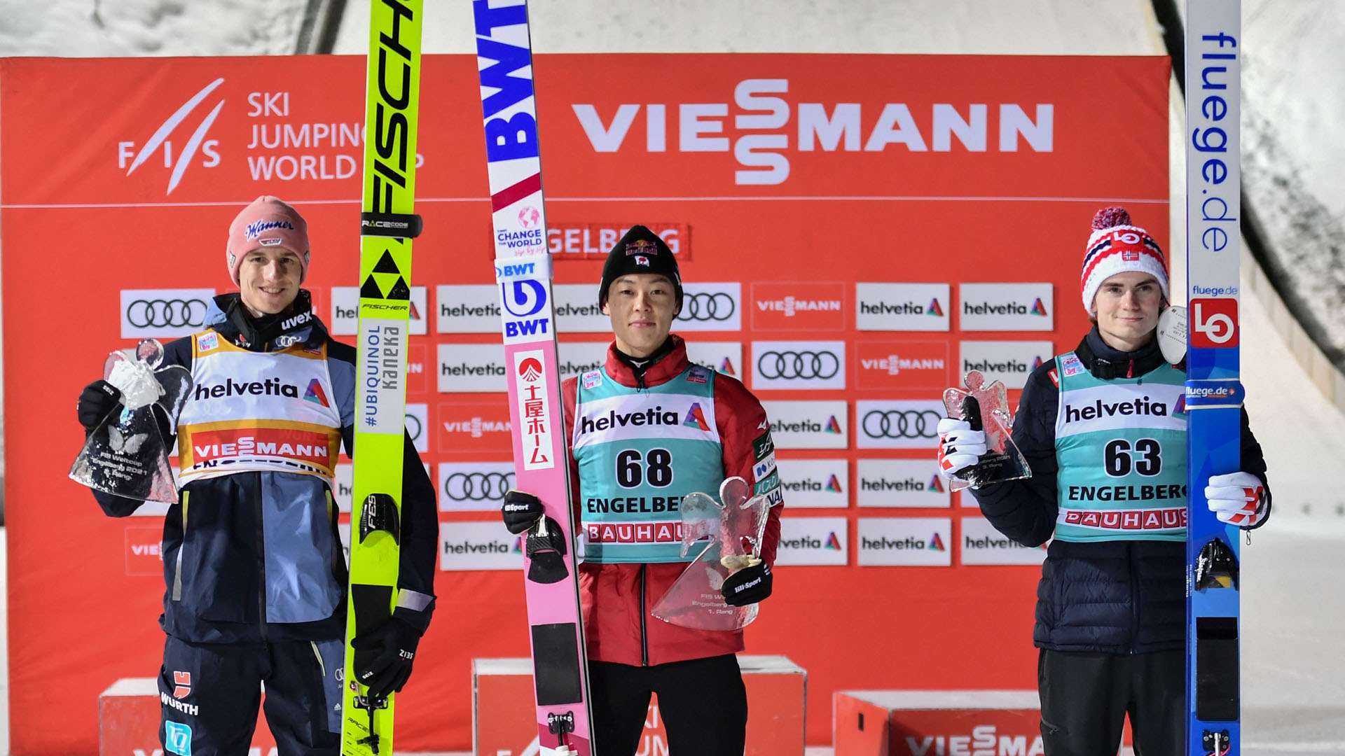 Second placed Germany's Karl Geiger, winner Japan's Ryoyu Kobayashi and third placed Norway's Marius Lindvik