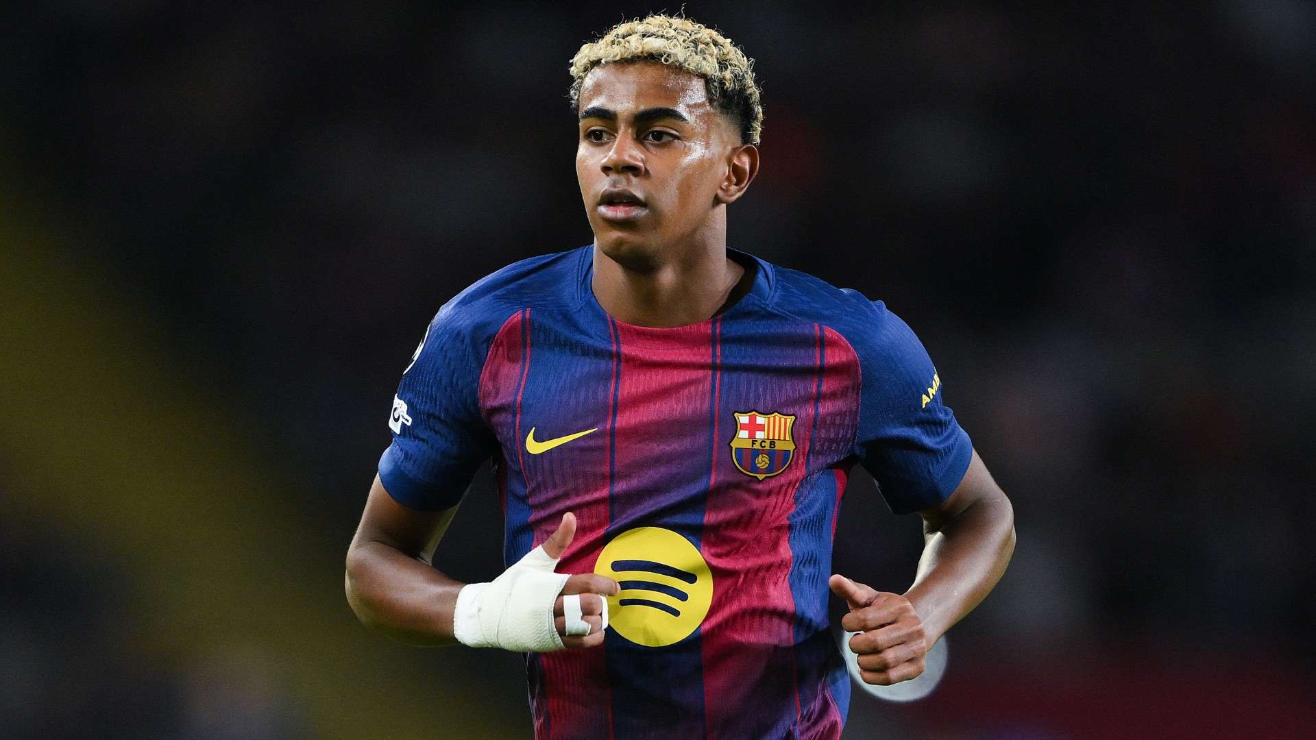 Lamine Yamal of FC Barcelona looks on