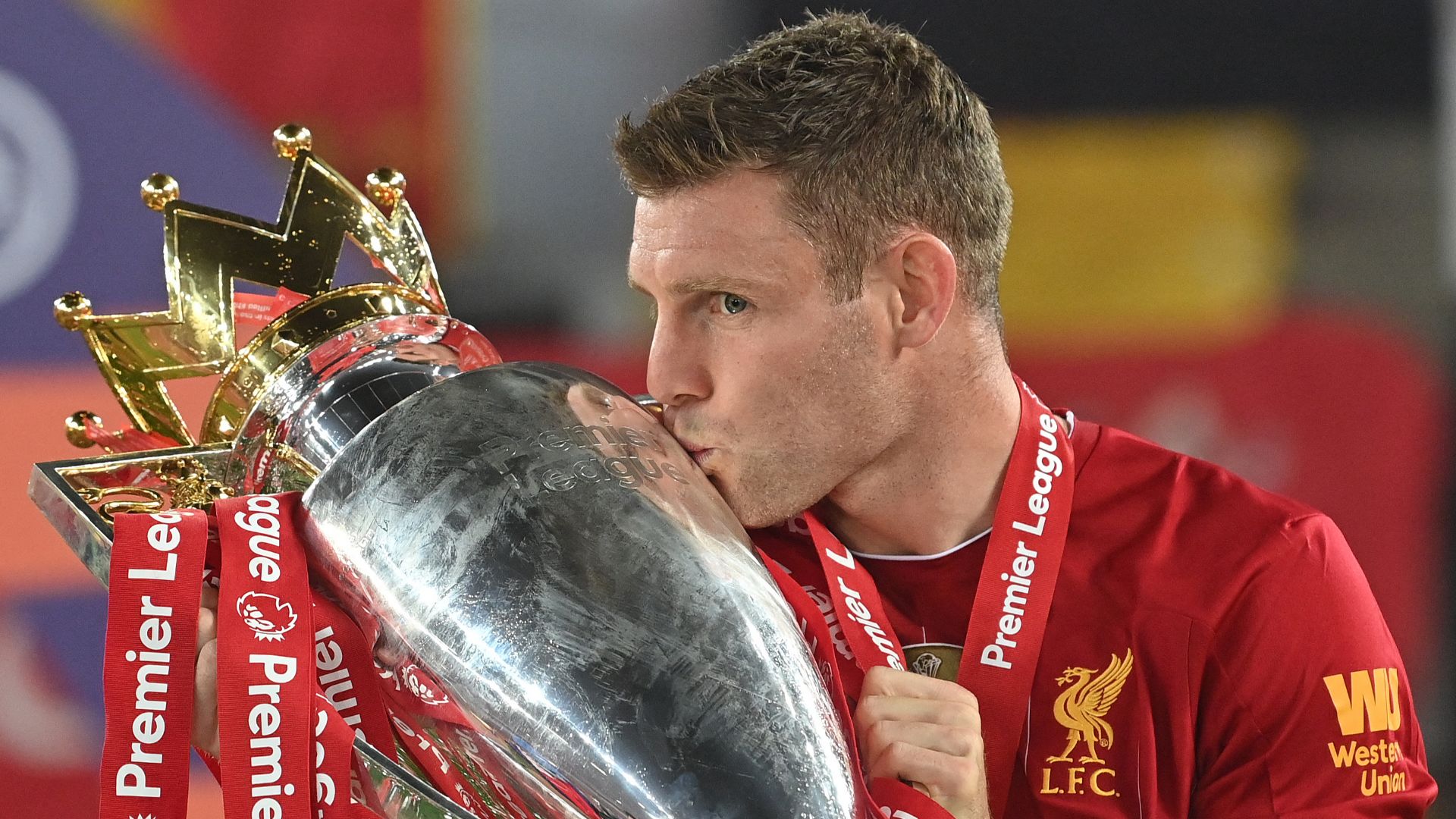 James Milner Premier League trophy Liverpool