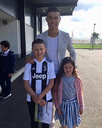 Cristiano Ronaldo with young fan