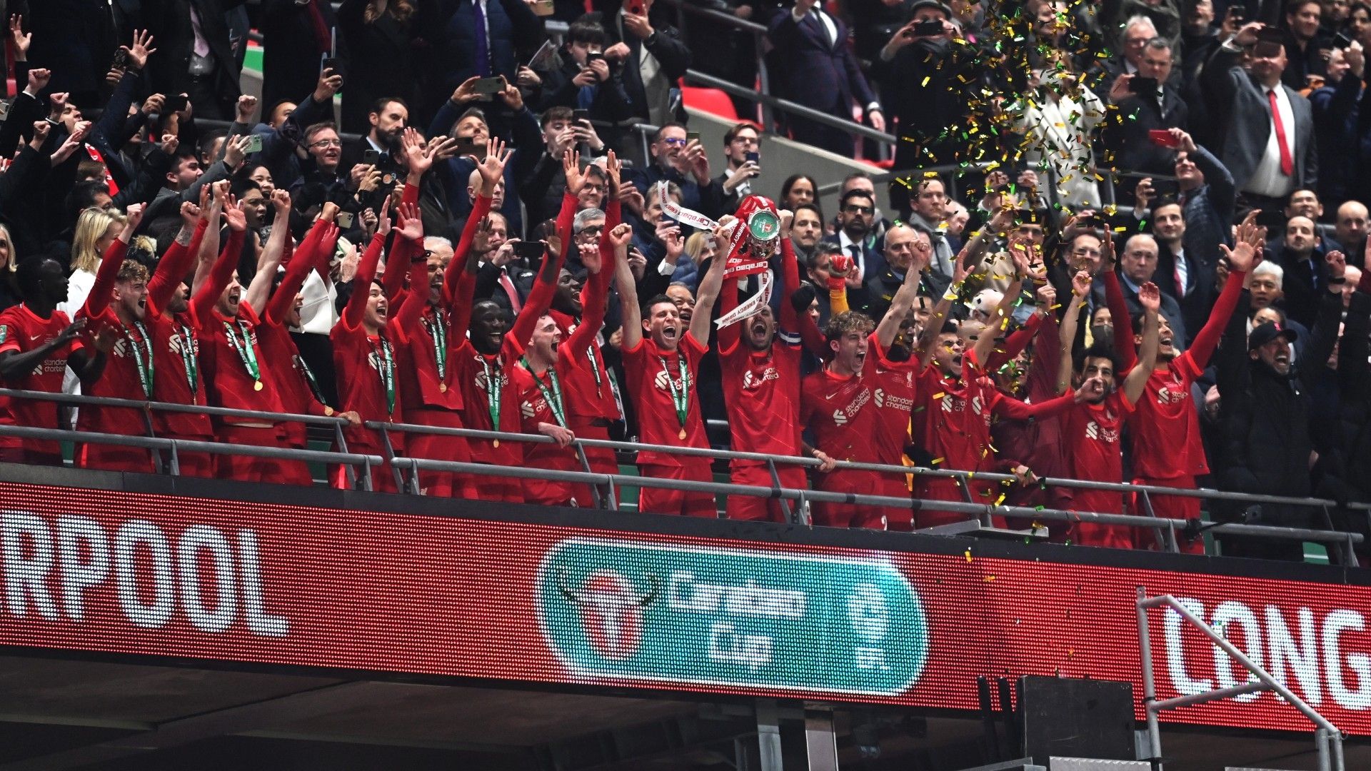 Liverpool celebrate trophy vs Chelsea Carabao Cup final 2021-22