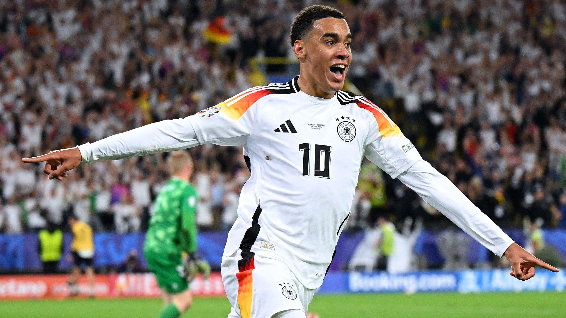 Jamal Musiala of Germany celebrates scoring 