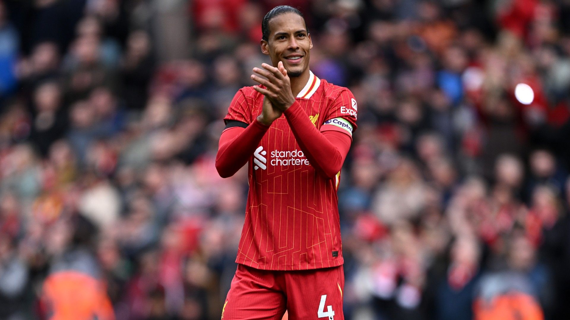   Virgil van Dijk of Liverpool acknowledges the fans 
