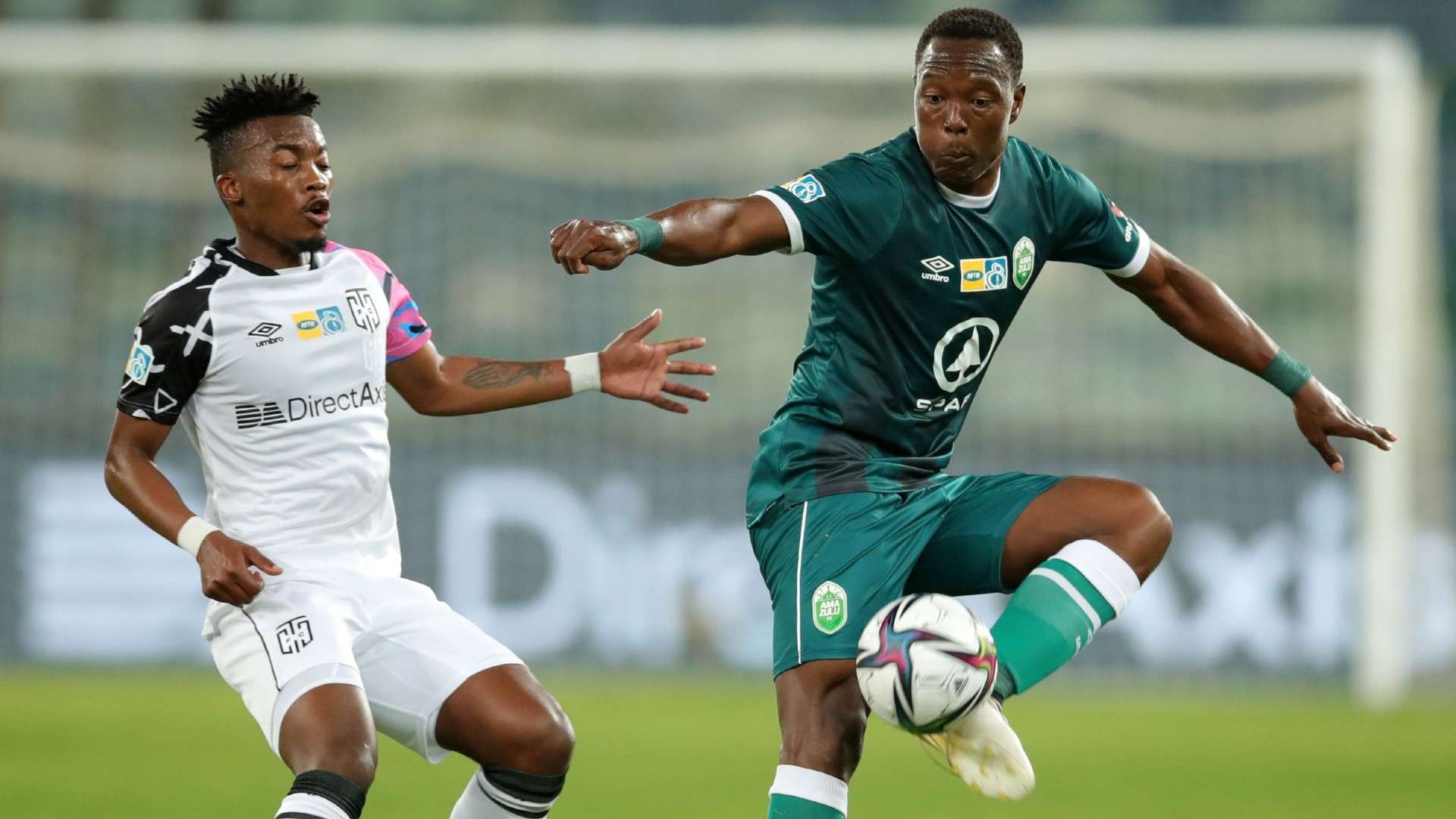 Philani Zulu of AmaZulu challenged by Khanyisa Mayo of Cape Town City during the 2021 MTN8 quarter final.
