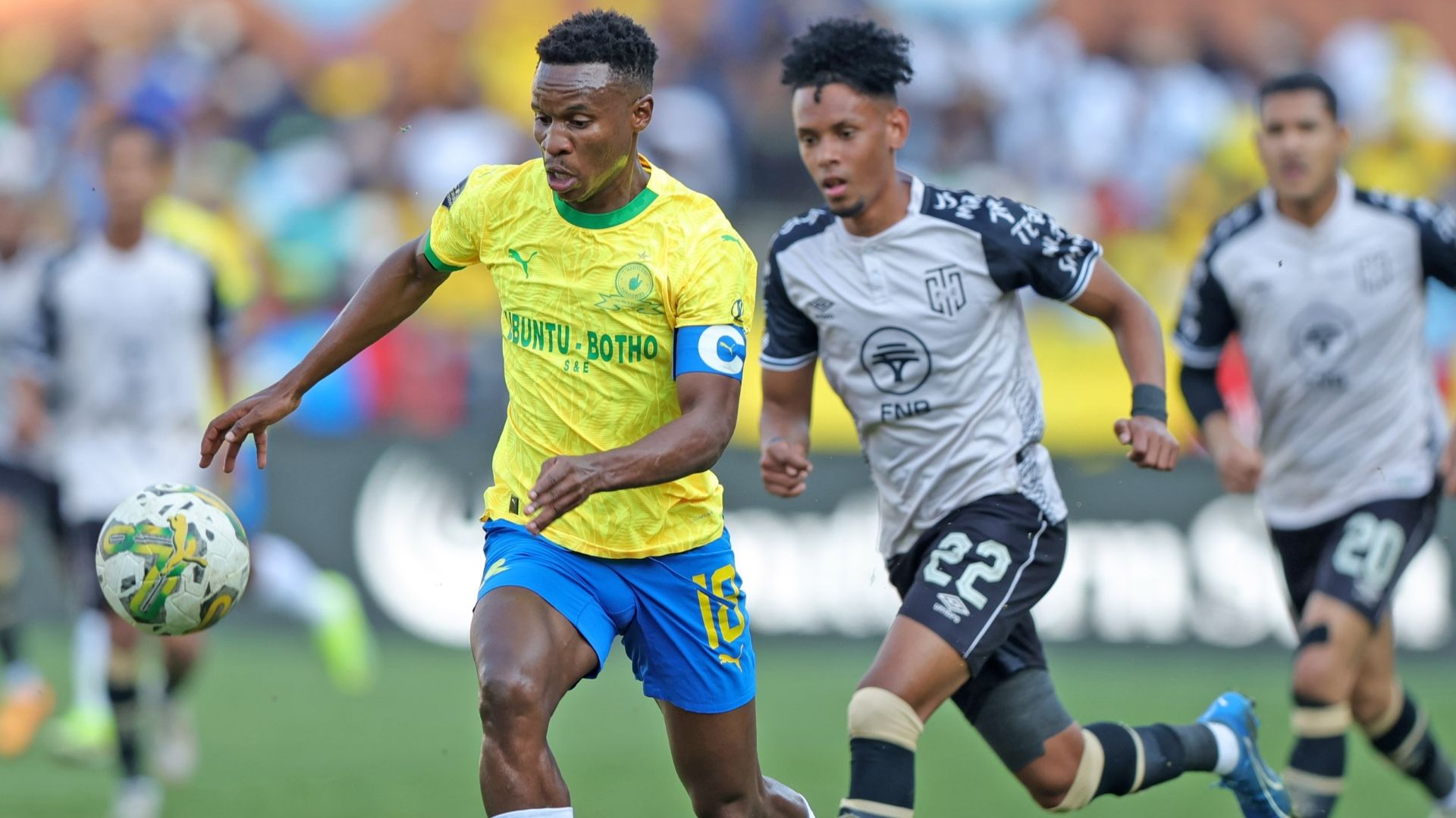 Themba Zwane of Mamelodi Sundowns & Patrick Fisher of Cape Town City. May 2024.
