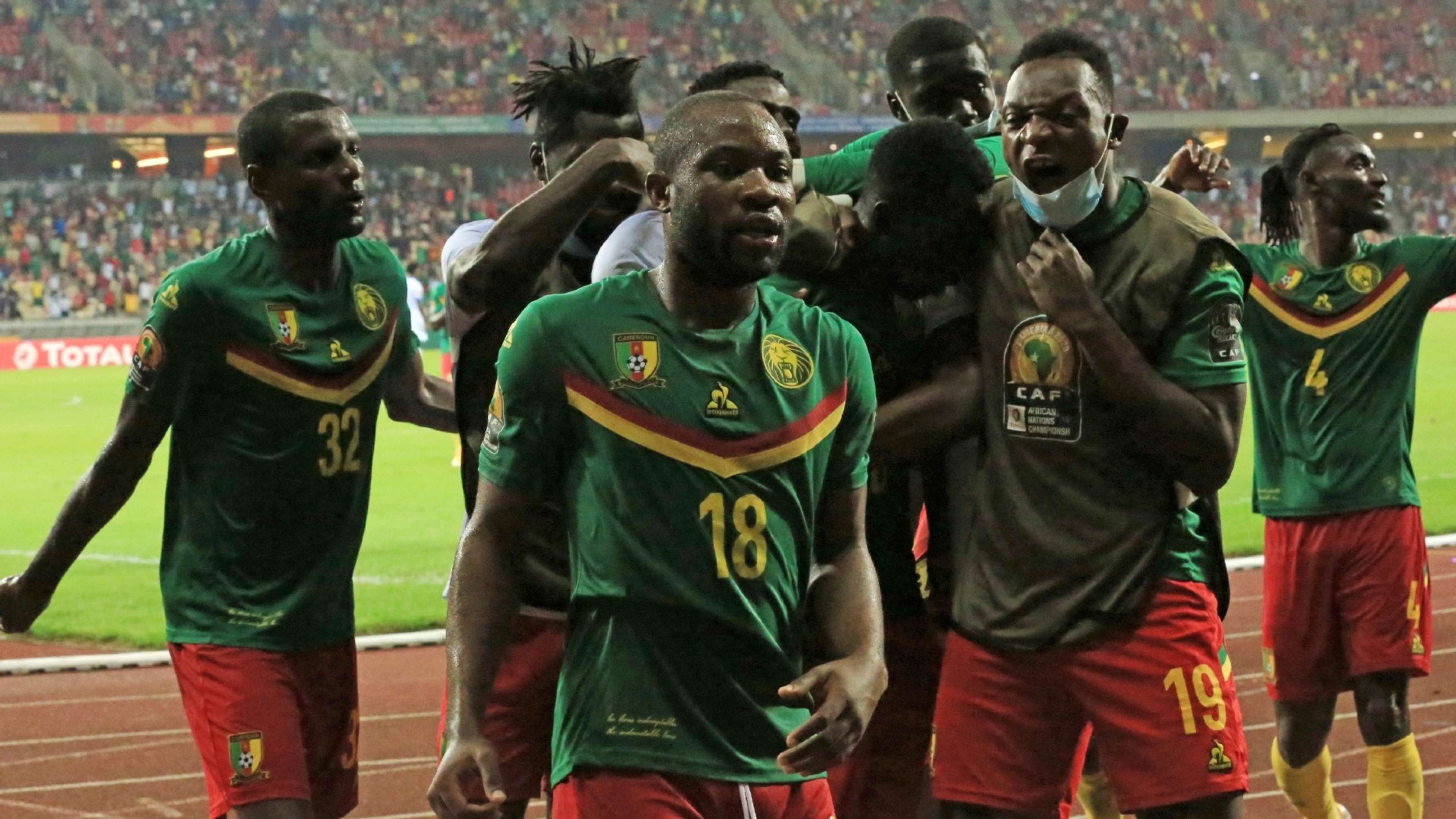 Cameroon players celebrate the winning goal scored by Felix Oukine.