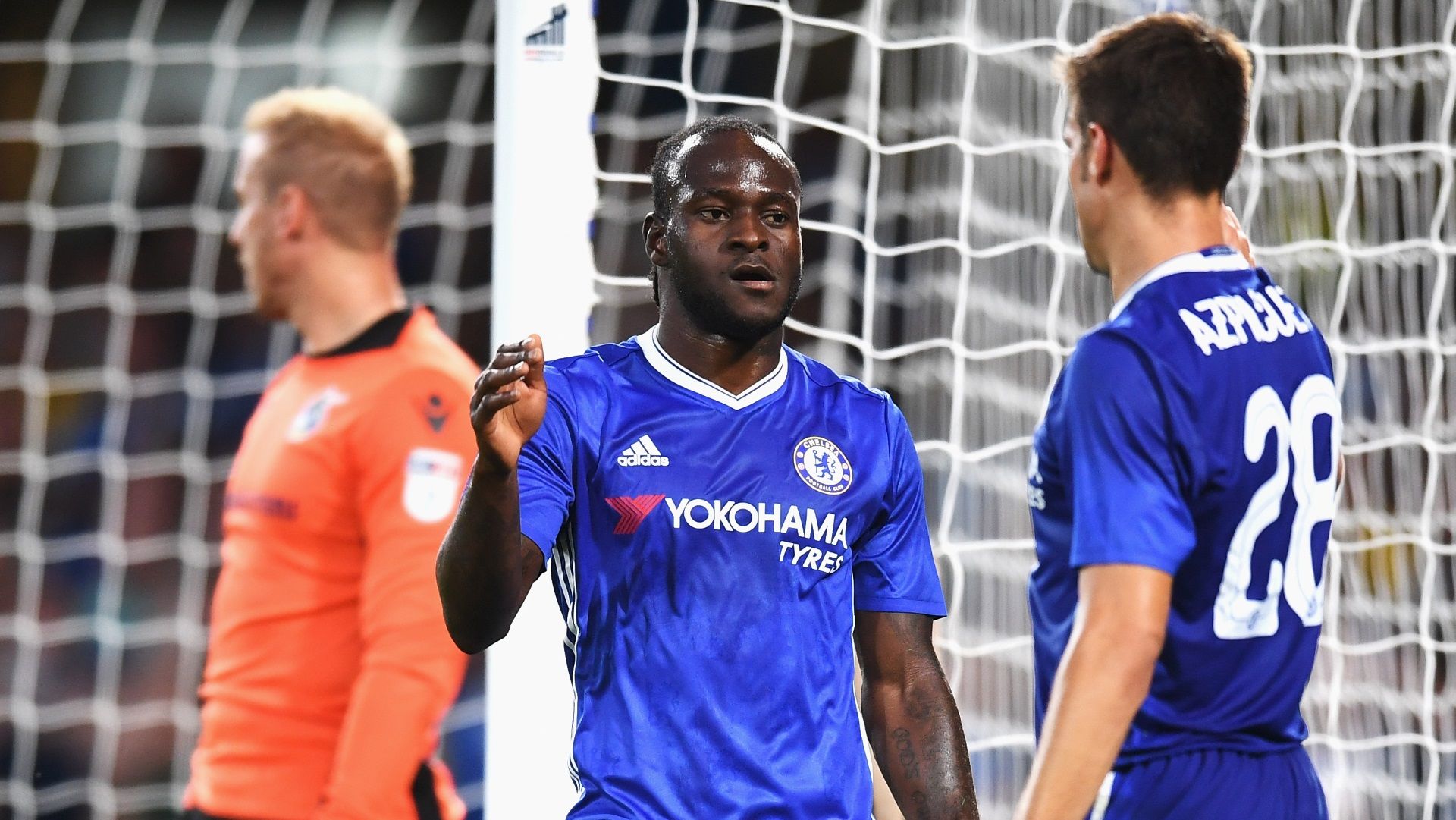 Victor Moses and Cesar Azpilicueta of Chelsea