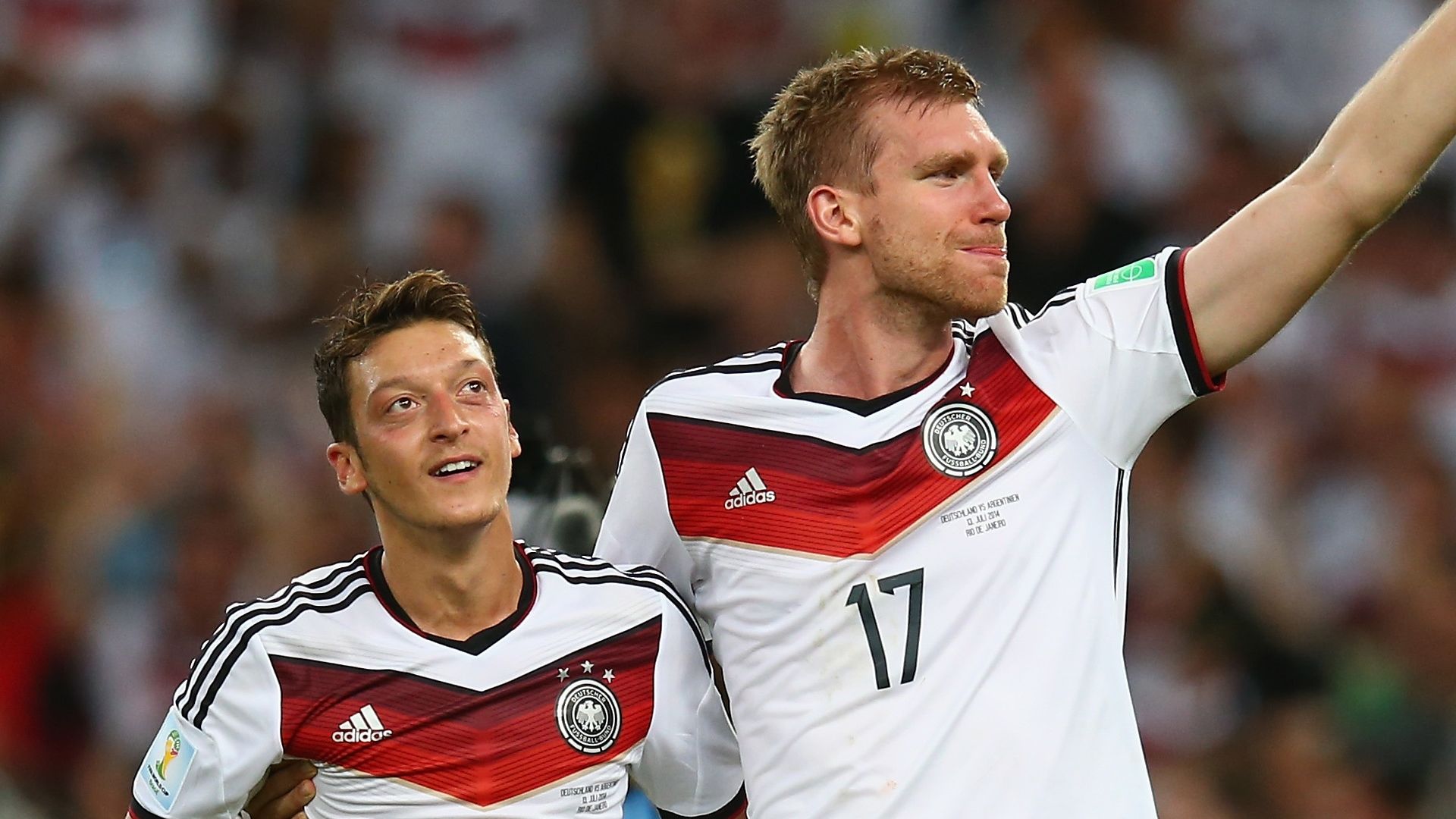 Mesut Ozil, Per Mertesacker