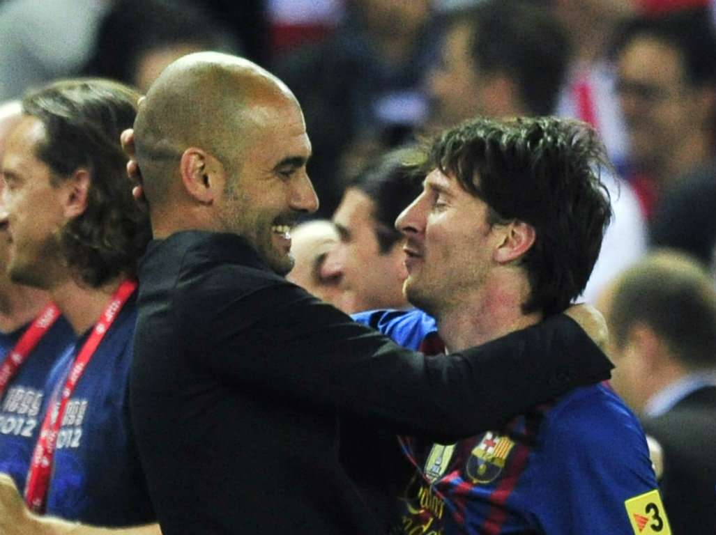 Pep Guardiola and Lionel Messi